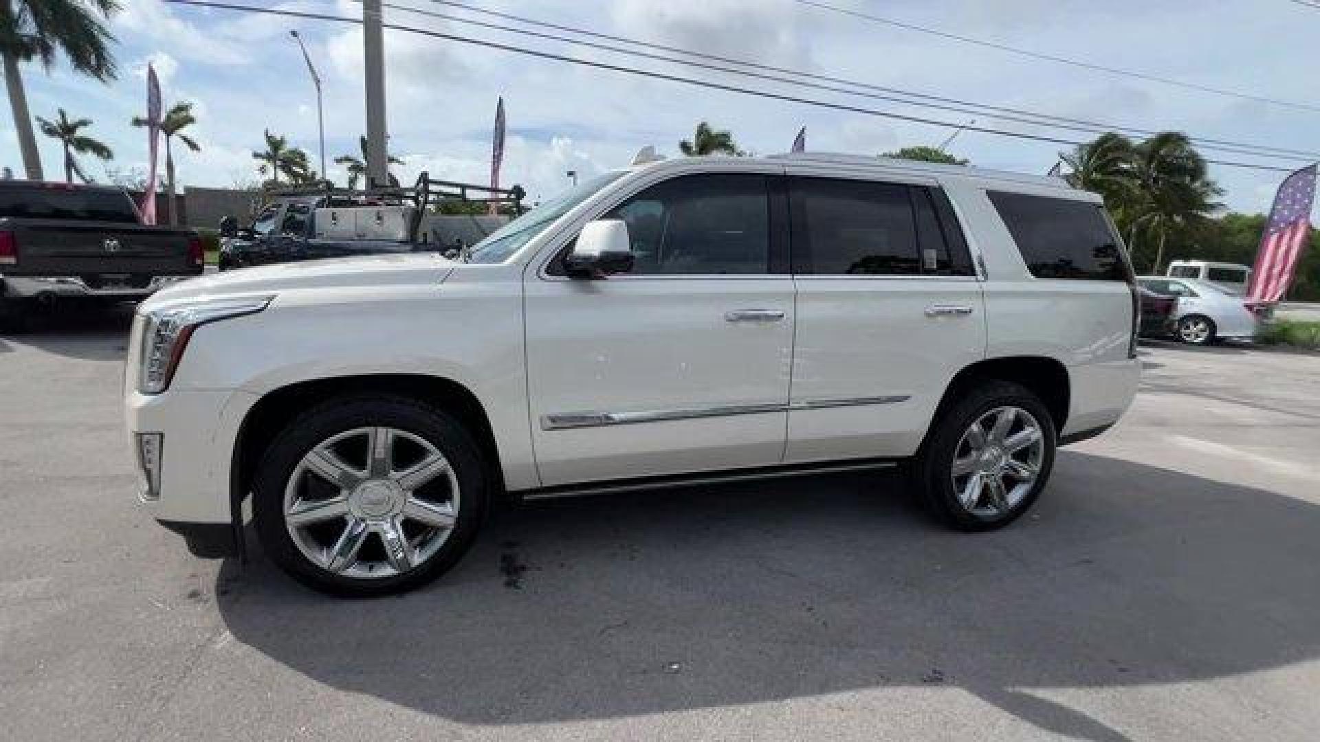 2015 White Diamond Tricoat /Jet Black Cadillac Escalade (1GYS3NKJ4FR) with an 8 6.2L engine, Automatic transmission, located at 27610 S Dixie Hwy, Homestead, FL, 33032, (305) 749-2348, 25.510241, -80.438301 - KBB.com 10 Best Luxury SUVs. Only 101,127 Miles! Delivers 22 Highway MPG and 15 City MPG! This Cadillac Escalade delivers a Gas V8 6.2L/376 engine powering this Automatic transmission. WHITE DIAMOND TRICOAT, WHEELS, 22 X 9 (55.9 CM X 22.9 CM) 7-SPOKE ALUMINUM WITH PREMIUM PAINT AND CHROME INSERTS (U - Photo#1