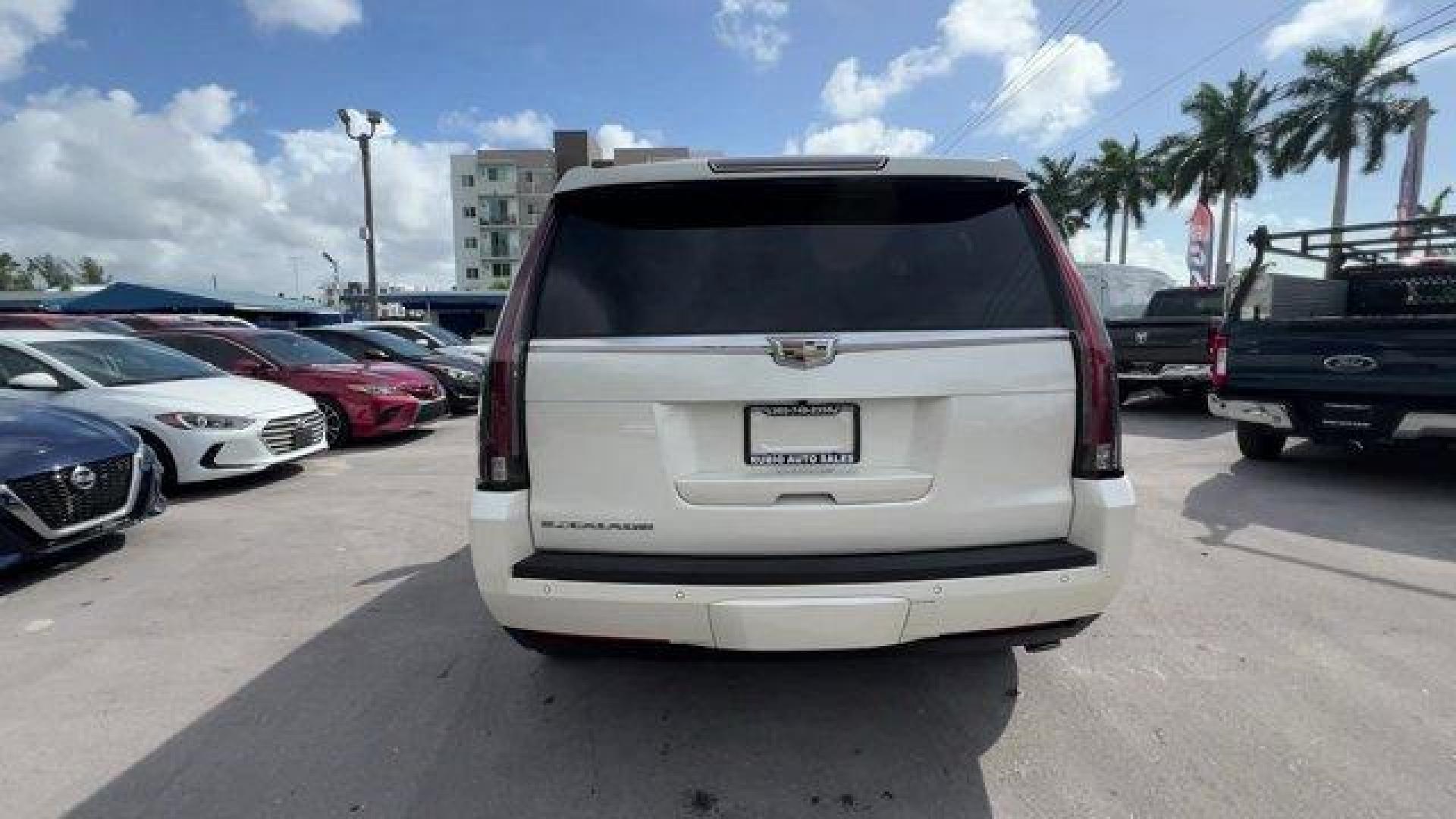 2015 White Diamond Tricoat /Jet Black Cadillac Escalade (1GYS3NKJ4FR) with an 8 6.2L engine, Automatic transmission, located at 27610 S Dixie Hwy, Homestead, FL, 33032, (305) 749-2348, 25.510241, -80.438301 - KBB.com 10 Best Luxury SUVs. Only 101,127 Miles! Delivers 22 Highway MPG and 15 City MPG! This Cadillac Escalade delivers a Gas V8 6.2L/376 engine powering this Automatic transmission. WHITE DIAMOND TRICOAT, WHEELS, 22 X 9 (55.9 CM X 22.9 CM) 7-SPOKE ALUMINUM WITH PREMIUM PAINT AND CHROME INSERTS (U - Photo#3