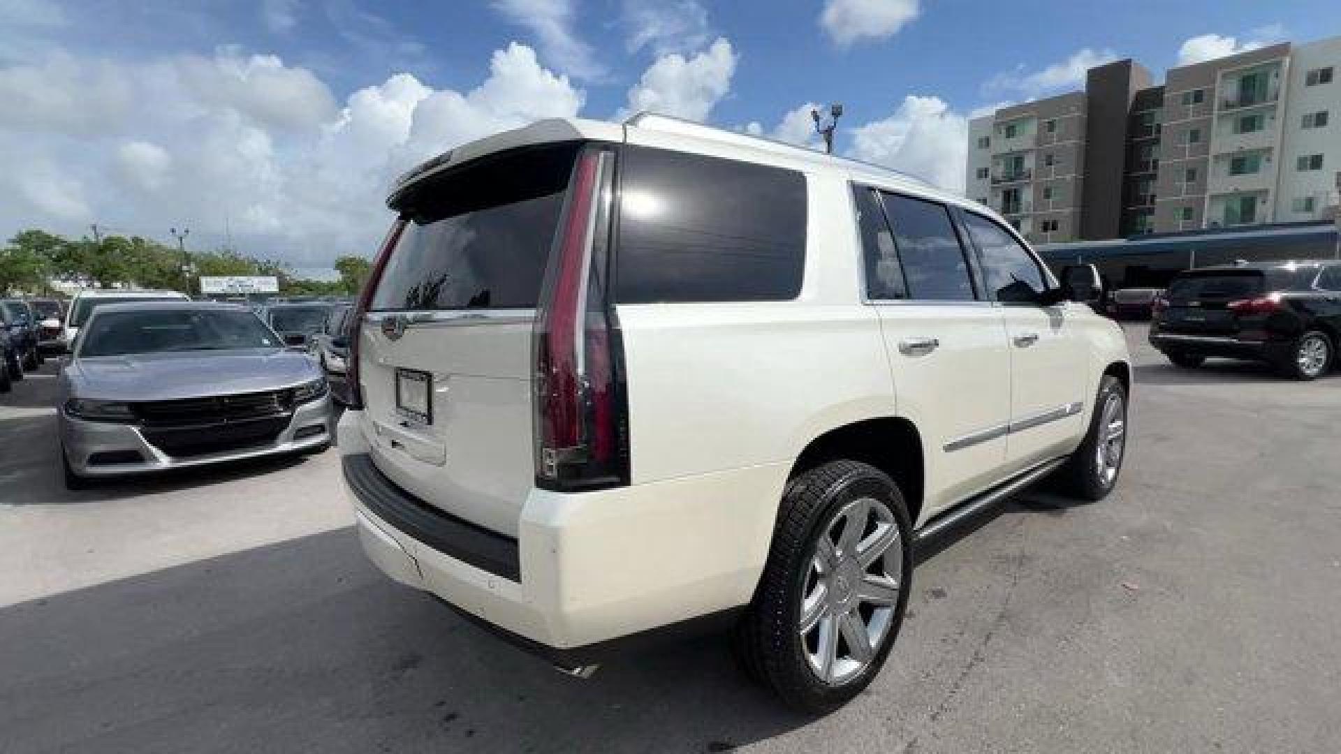 2015 White Diamond Tricoat /Jet Black Cadillac Escalade (1GYS3NKJ4FR) with an 8 6.2L engine, Automatic transmission, located at 27610 S Dixie Hwy, Homestead, FL, 33032, (305) 749-2348, 25.510241, -80.438301 - KBB.com 10 Best Luxury SUVs. Only 101,127 Miles! Delivers 22 Highway MPG and 15 City MPG! This Cadillac Escalade delivers a Gas V8 6.2L/376 engine powering this Automatic transmission. WHITE DIAMOND TRICOAT, WHEELS, 22 X 9 (55.9 CM X 22.9 CM) 7-SPOKE ALUMINUM WITH PREMIUM PAINT AND CHROME INSERTS (U - Photo#4