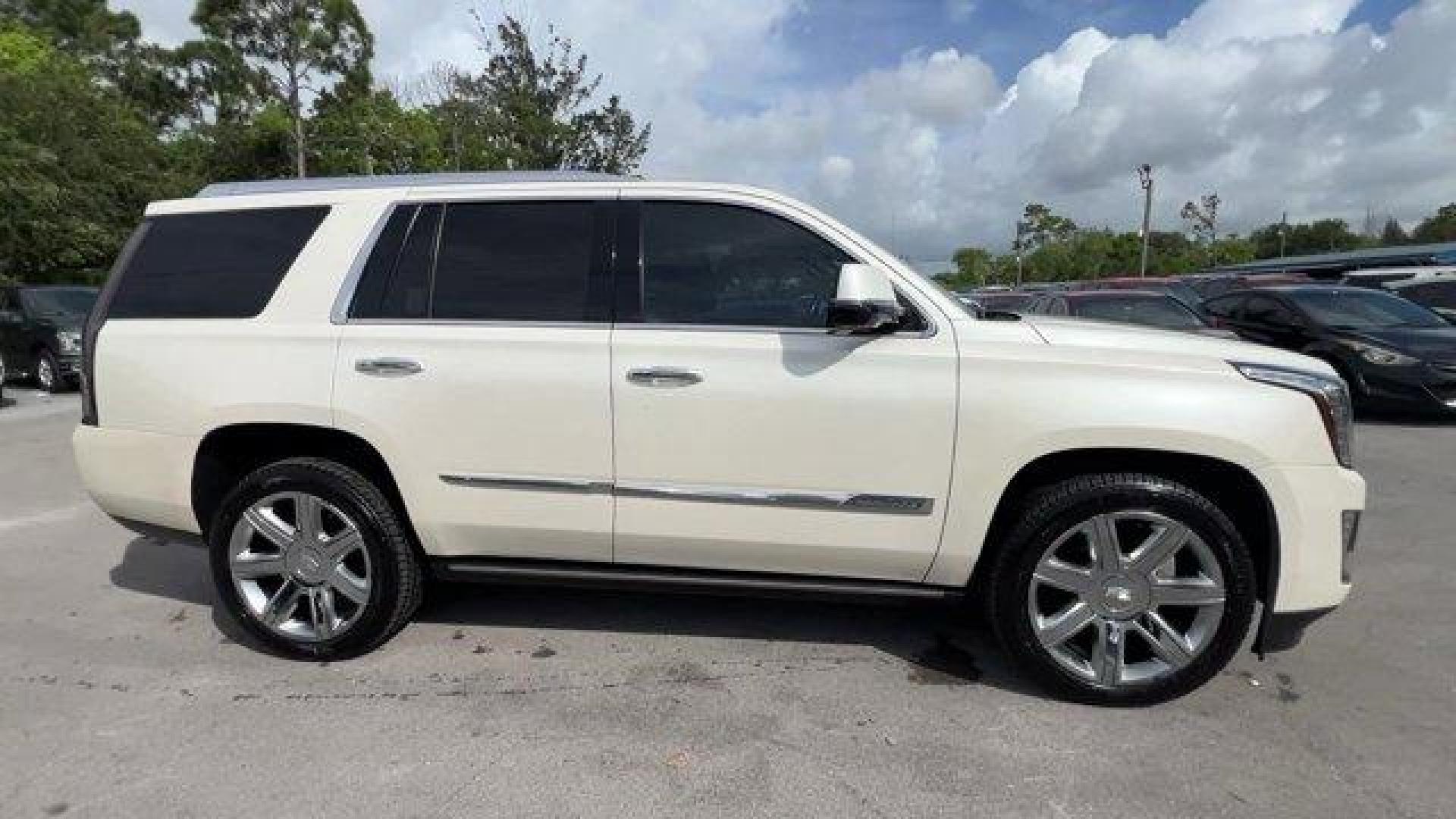 2015 White Diamond Tricoat /Jet Black Cadillac Escalade (1GYS3NKJ4FR) with an 8 6.2L engine, Automatic transmission, located at 27610 S Dixie Hwy, Homestead, FL, 33032, (305) 749-2348, 25.510241, -80.438301 - KBB.com 10 Best Luxury SUVs. Only 101,127 Miles! Delivers 22 Highway MPG and 15 City MPG! This Cadillac Escalade delivers a Gas V8 6.2L/376 engine powering this Automatic transmission. WHITE DIAMOND TRICOAT, WHEELS, 22 X 9 (55.9 CM X 22.9 CM) 7-SPOKE ALUMINUM WITH PREMIUM PAINT AND CHROME INSERTS (U - Photo#5