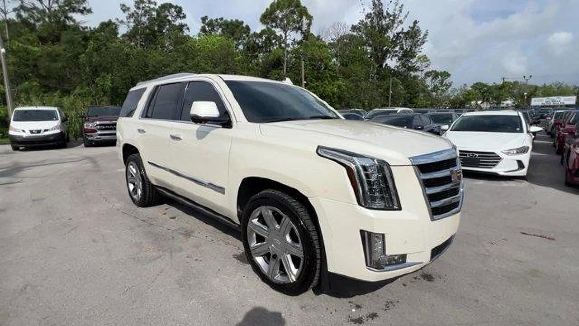 2015 White Diamond Tricoat /Jet Black Cadillac Escalade (1GYS3NKJ4FR) with an 8 6.2L engine, Automatic transmission, located at 27610 S Dixie Hwy, Homestead, FL, 33032, (305) 749-2348, 25.510241, -80.438301 - KBB.com 10 Best Luxury SUVs. Only 101,127 Miles! Delivers 22 Highway MPG and 15 City MPG! This Cadillac Escalade delivers a Gas V8 6.2L/376 engine powering this Automatic transmission. WHITE DIAMOND TRICOAT, WHEELS, 22 X 9 (55.9 CM X 22.9 CM) 7-SPOKE ALUMINUM WITH PREMIUM PAINT AND CHROME INSERTS (U - Photo#6