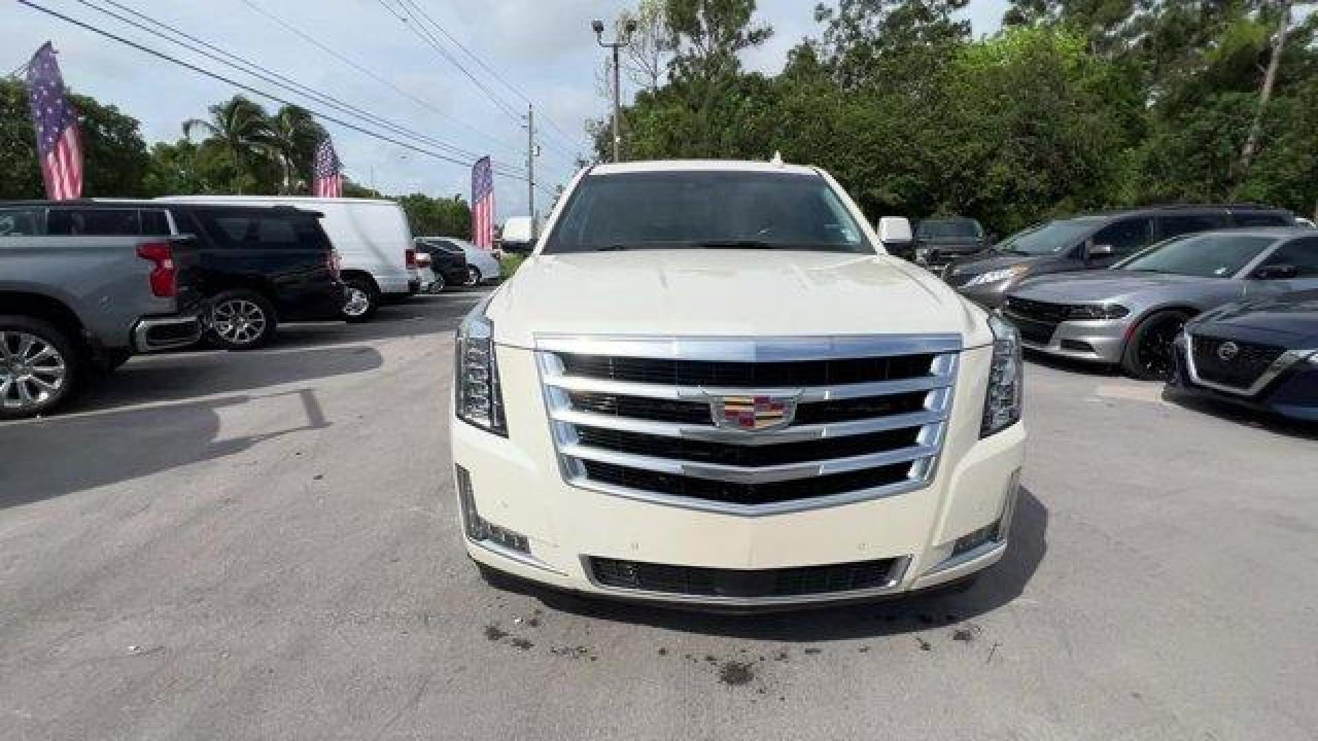 2015 White Diamond Tricoat /Jet Black Cadillac Escalade (1GYS3NKJ4FR) with an 8 6.2L engine, Automatic transmission, located at 27610 S Dixie Hwy, Homestead, FL, 33032, (305) 749-2348, 25.510241, -80.438301 - KBB.com 10 Best Luxury SUVs. Only 101,127 Miles! Delivers 22 Highway MPG and 15 City MPG! This Cadillac Escalade delivers a Gas V8 6.2L/376 engine powering this Automatic transmission. WHITE DIAMOND TRICOAT, WHEELS, 22 X 9 (55.9 CM X 22.9 CM) 7-SPOKE ALUMINUM WITH PREMIUM PAINT AND CHROME INSERTS (U - Photo#7