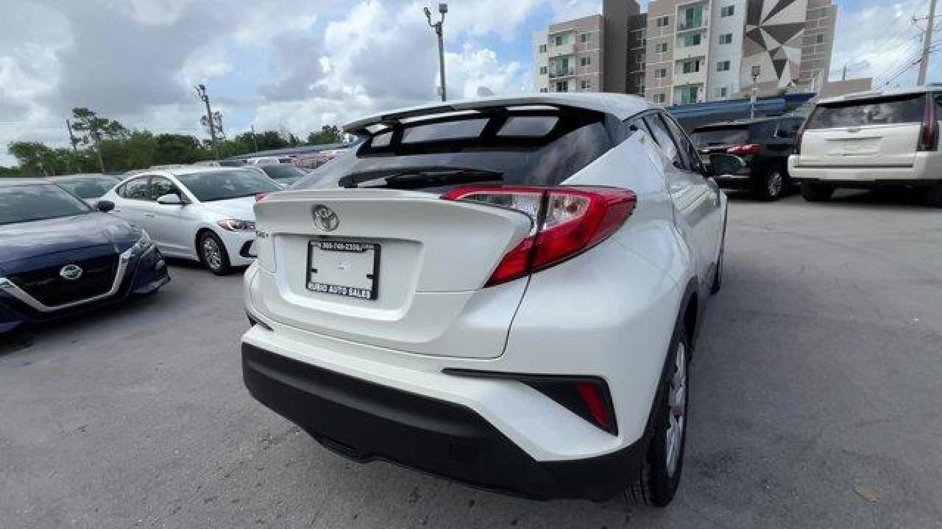 2019 White Toyota C-HR (JTNKHMBX8K1) with an 4 2.0 L engine, Variable transmission, located at 27610 S Dixie Hwy, Homestead, FL, 33032, (305) 749-2348, 25.510241, -80.438301 - KBB.com Brand Image Awards. Scores 31 Highway MPG and 27 City MPG! This Toyota C-HR delivers a Regular Unleaded I-4 2.0 L/121 engine powering this Variable transmission. Wing Spoiler, VSC Electronic Stability Control (ESC), Variable Intermittent Wipers.*This Toyota C-HR Comes Equipped with These Opt - Photo#4