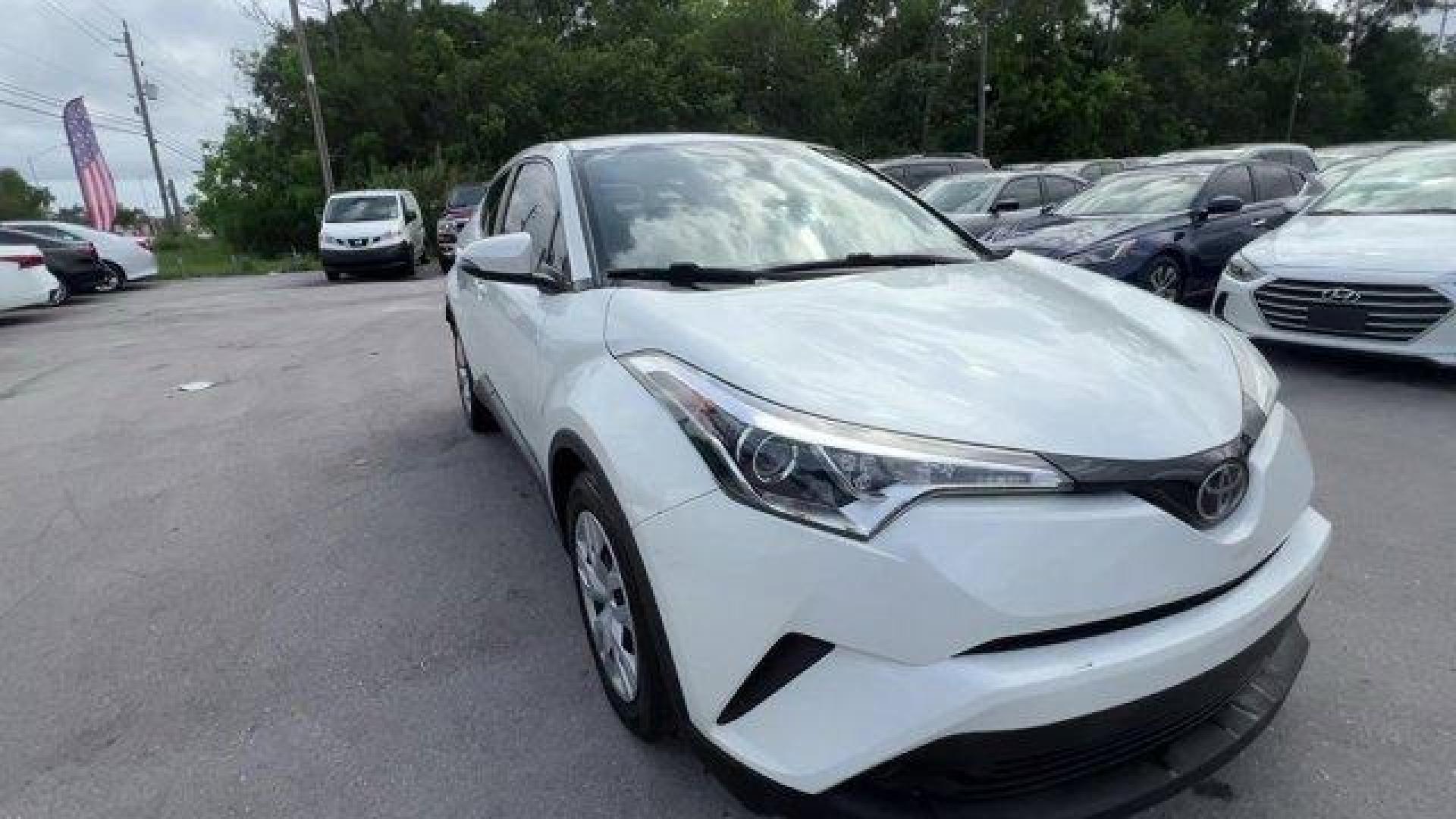 2019 White Toyota C-HR (JTNKHMBX8K1) with an 4 2.0 L engine, Variable transmission, located at 27610 S Dixie Hwy, Homestead, FL, 33032, (305) 749-2348, 25.510241, -80.438301 - KBB.com Brand Image Awards. Scores 31 Highway MPG and 27 City MPG! This Toyota C-HR delivers a Regular Unleaded I-4 2.0 L/121 engine powering this Variable transmission. Wing Spoiler, VSC Electronic Stability Control (ESC), Variable Intermittent Wipers.*This Toyota C-HR Comes Equipped with These Opt - Photo#7