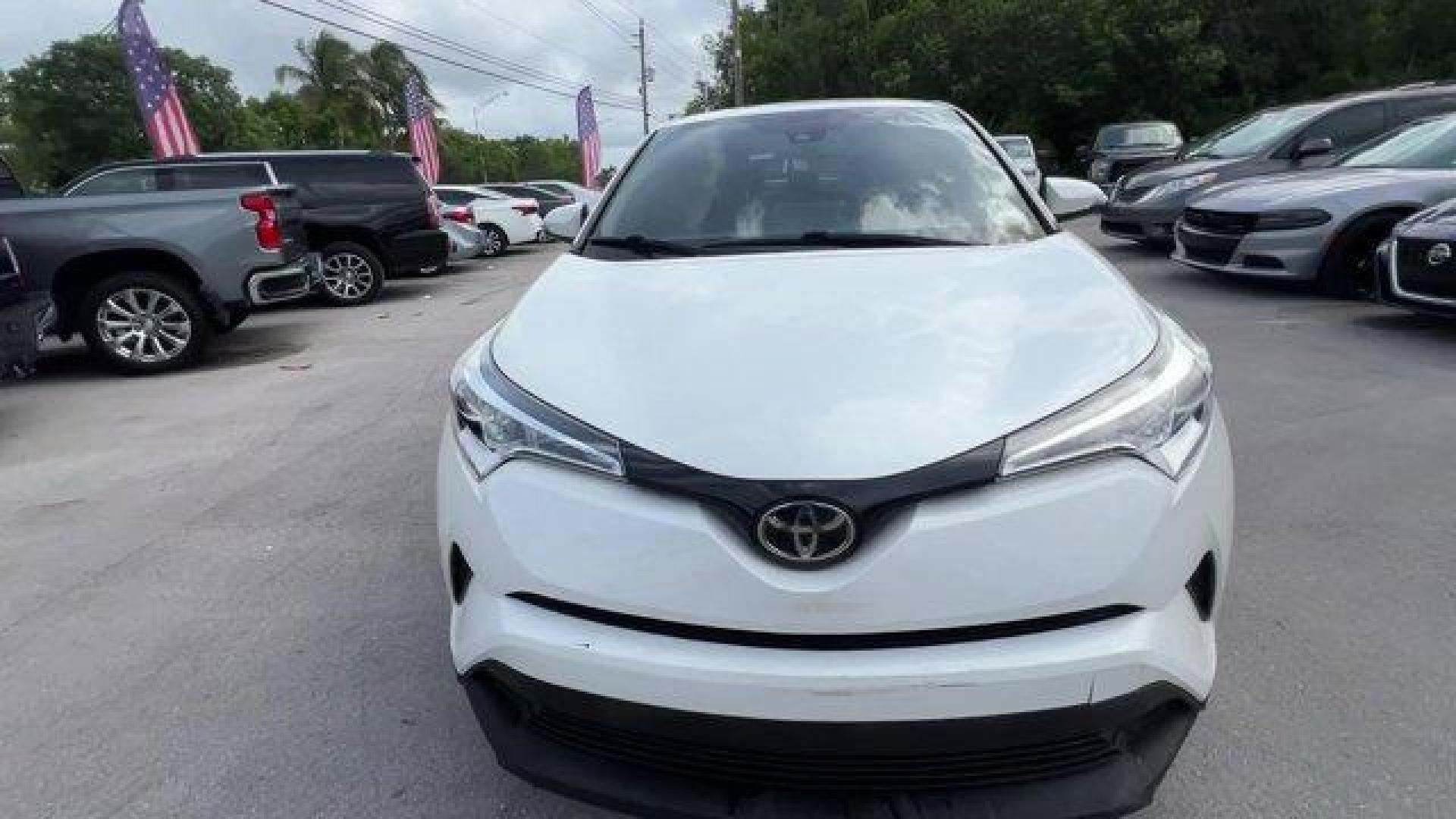 2019 White Toyota C-HR (JTNKHMBX8K1) with an 4 2.0 L engine, Variable transmission, located at 27610 S Dixie Hwy, Homestead, FL, 33032, (305) 749-2348, 25.510241, -80.438301 - KBB.com Brand Image Awards. Scores 31 Highway MPG and 27 City MPG! This Toyota C-HR delivers a Regular Unleaded I-4 2.0 L/121 engine powering this Variable transmission. Wing Spoiler, VSC Electronic Stability Control (ESC), Variable Intermittent Wipers.*This Toyota C-HR Comes Equipped with These Opt - Photo#7