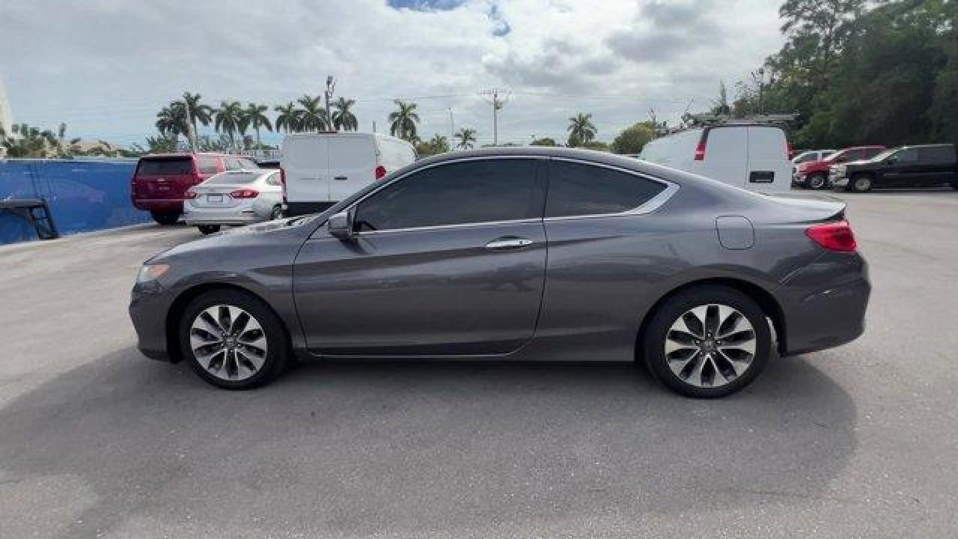 2013 Gray Honda Accord Cpe (1HGCT1B85DA) with an 4 2.4L engine, Variable transmission, located at 27610 S Dixie Hwy, Homestead, FL, 33032, (305) 749-2348, 25.510241, -80.438301 - KBB.com Brand Image Awards. Only 117,010 Miles! Boasts 35 Highway MPG and 26 City MPG! This Honda Accord Cpe delivers a Gas I4 2.4L/144 engine powering this Variable transmission. XM satellite radio (subscription required), Vehicle Stability Assist (VSA) w/traction control, Variable pwr rack and p - Photo#1