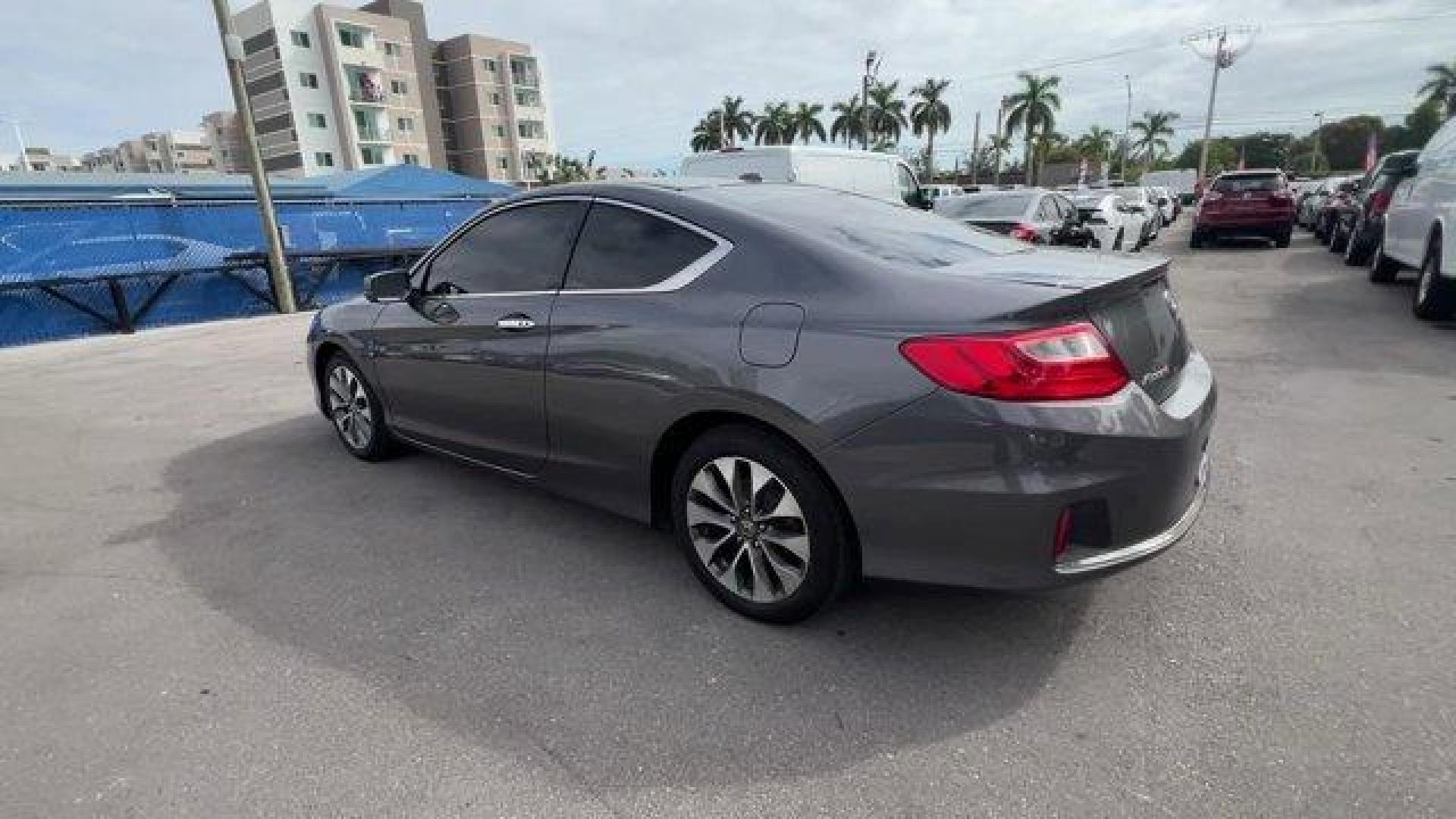 2013 Gray Honda Accord Cpe (1HGCT1B85DA) with an 4 2.4L engine, Variable transmission, located at 27610 S Dixie Hwy, Homestead, FL, 33032, (305) 749-2348, 25.510241, -80.438301 - KBB.com Brand Image Awards. Only 117,010 Miles! Boasts 35 Highway MPG and 26 City MPG! This Honda Accord Cpe delivers a Gas I4 2.4L/144 engine powering this Variable transmission. XM satellite radio (subscription required), Vehicle Stability Assist (VSA) w/traction control, Variable pwr rack and p - Photo#2