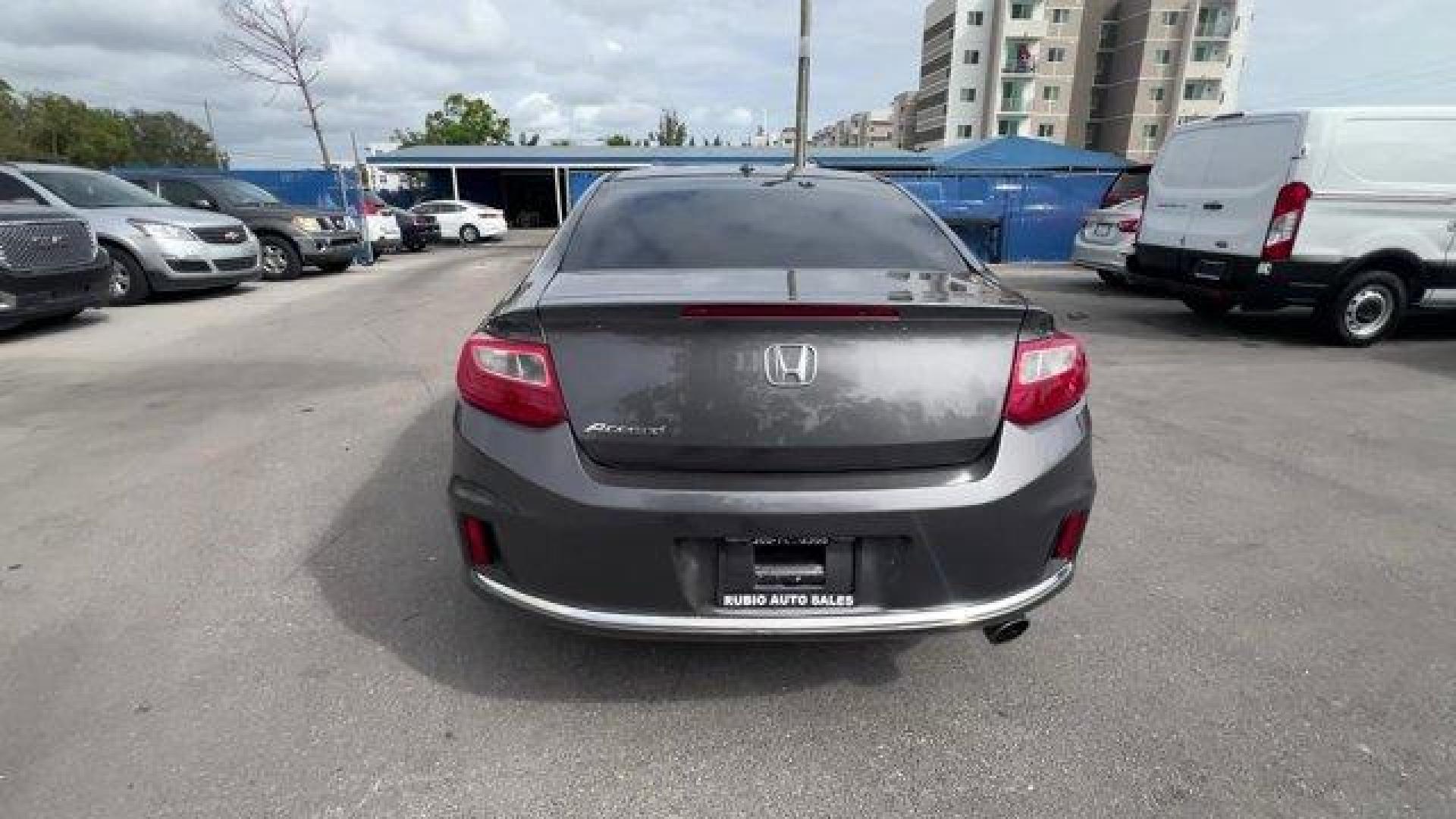 2013 Gray Honda Accord Cpe (1HGCT1B85DA) with an 4 2.4L engine, Variable transmission, located at 27610 S Dixie Hwy, Homestead, FL, 33032, (305) 749-2348, 25.510241, -80.438301 - KBB.com Brand Image Awards. Only 117,010 Miles! Boasts 35 Highway MPG and 26 City MPG! This Honda Accord Cpe delivers a Gas I4 2.4L/144 engine powering this Variable transmission. XM satellite radio (subscription required), Vehicle Stability Assist (VSA) w/traction control, Variable pwr rack and p - Photo#3