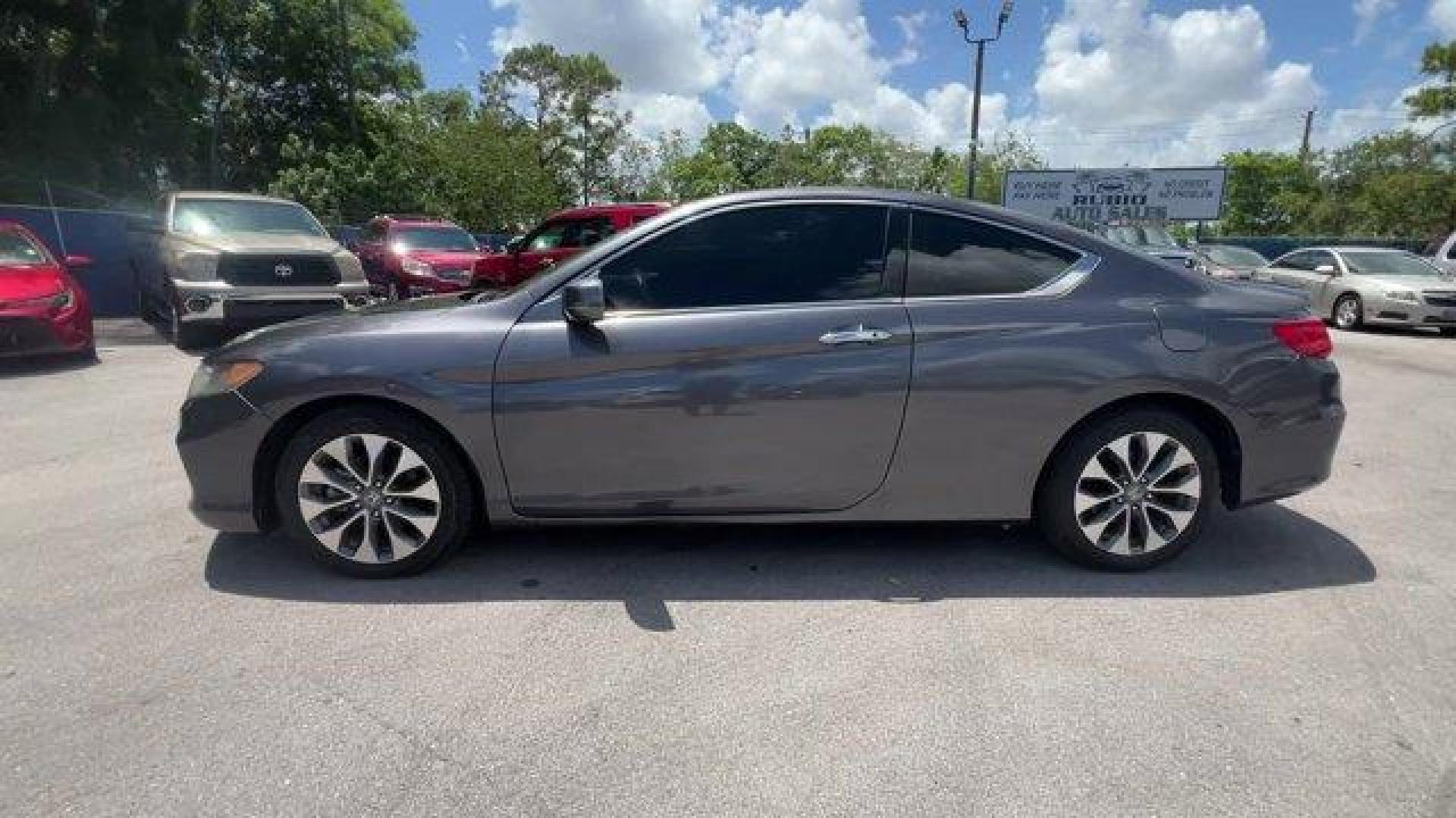 2013 Gray Honda Accord Cpe (1HGCT1B85DA) with an 4 2.4L engine, Variable transmission, located at 27610 S Dixie Hwy, Homestead, FL, 33032, (305) 749-2348, 25.510241, -80.438301 - KBB.com Brand Image Awards. Only 117,010 Miles! Boasts 35 Highway MPG and 26 City MPG! This Honda Accord Cpe delivers a Gas I4 2.4L/144 engine powering this Variable transmission. XM satellite radio (subscription required), Vehicle Stability Assist (VSA) w/traction control, Variable pwr rack and p - Photo#1