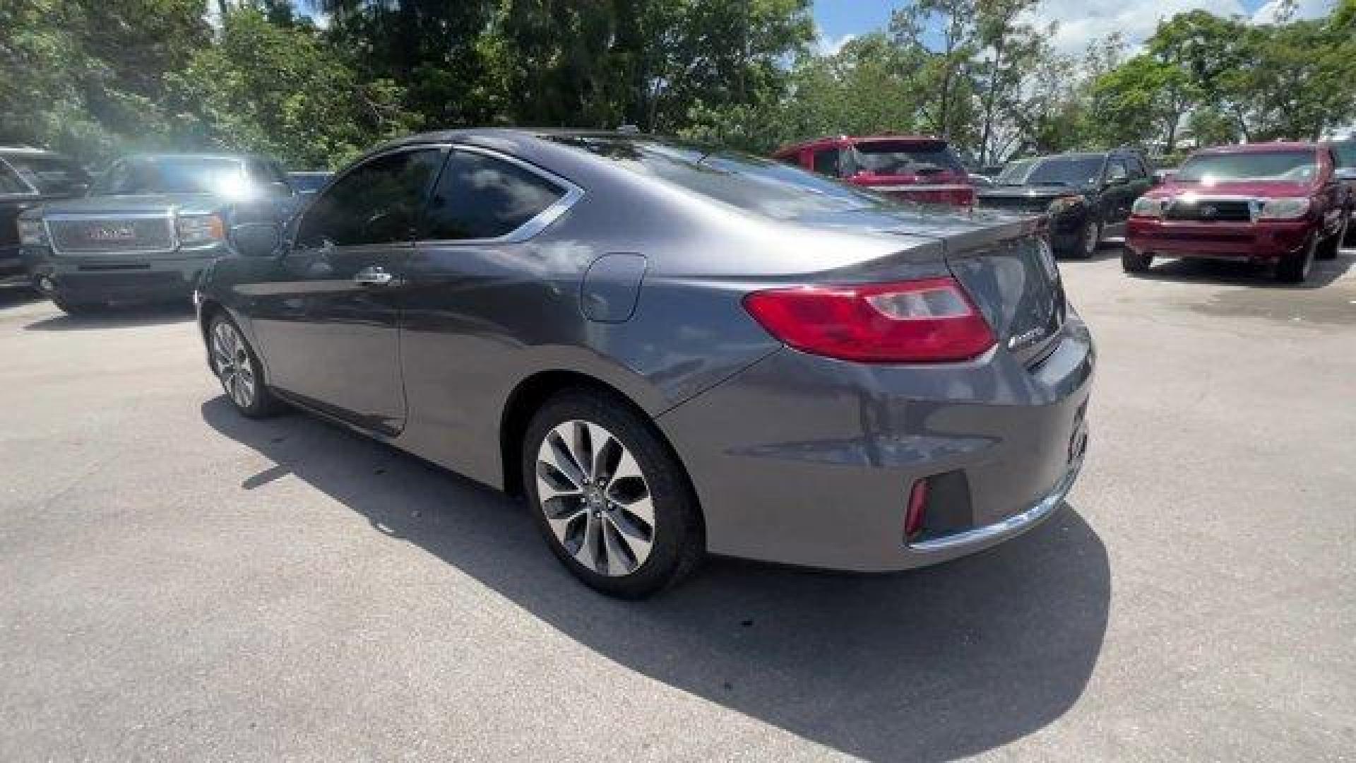 2013 Gray Honda Accord Cpe (1HGCT1B85DA) with an 4 2.4L engine, Variable transmission, located at 27610 S Dixie Hwy, Homestead, FL, 33032, (305) 749-2348, 25.510241, -80.438301 - KBB.com Brand Image Awards. Only 117,010 Miles! Boasts 35 Highway MPG and 26 City MPG! This Honda Accord Cpe delivers a Gas I4 2.4L/144 engine powering this Variable transmission. XM satellite radio (subscription required), Vehicle Stability Assist (VSA) w/traction control, Variable pwr rack and p - Photo#2