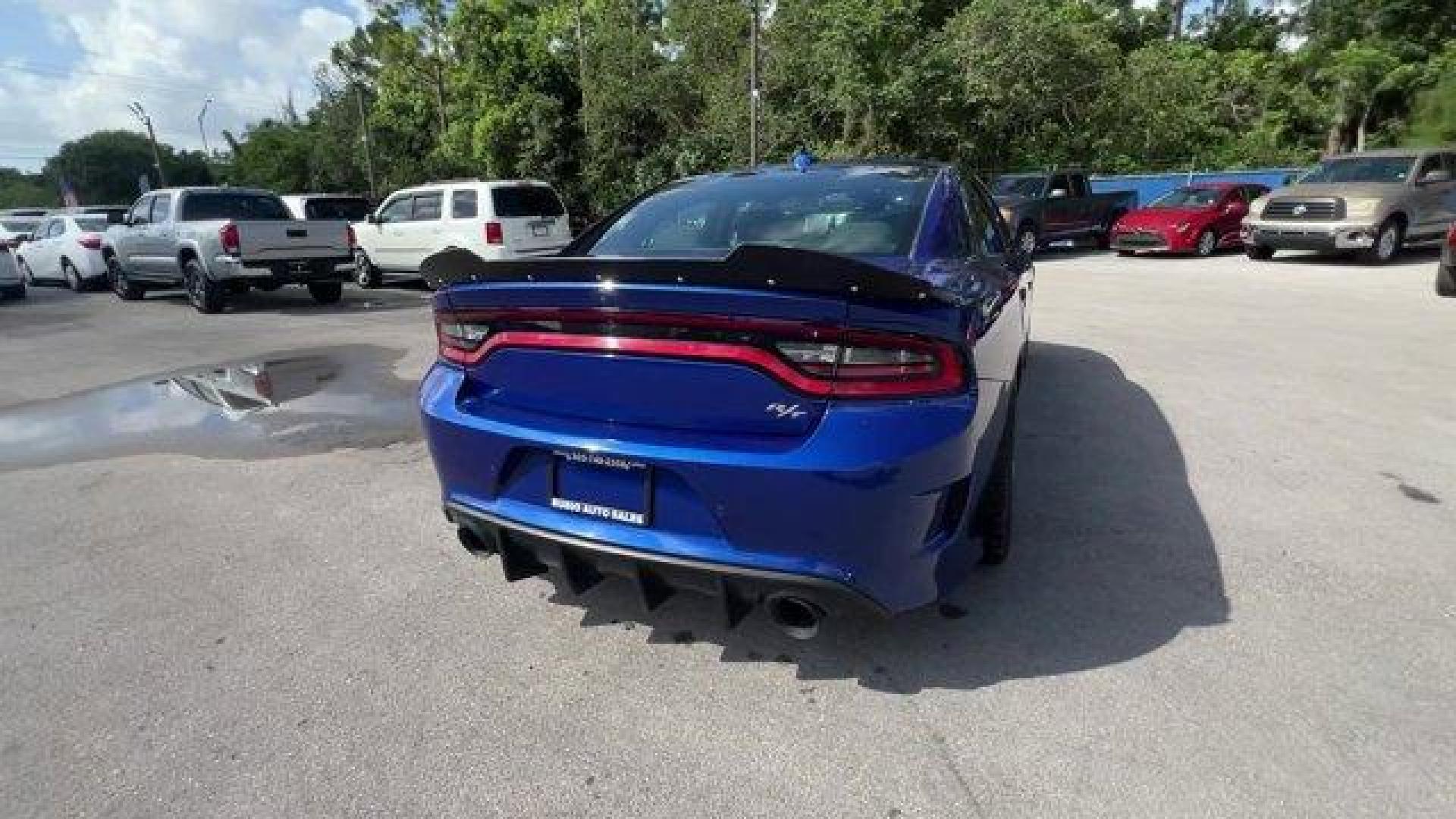 2019 Indigo Blue /Black Dodge Charger (2C3CDXCT5KH) with an 8 5.7 L engine, Automatic transmission, located at 27610 S Dixie Hwy, Homestead, FL, 33032, (305) 749-2348, 25.510241, -80.438301 - KBB.com Best Resale Value Awards. Only 17,596 Miles! Scores 25 Highway MPG and 16 City MPG! This Dodge Charger delivers a Regular Unleaded V-8 5.7 L/345 engine powering this Automatic transmission. WHEELS: 20 X 8.0 GRANITE CRYSTAL ALUMINUM (STD), TRANSMISSION: 8-SPEED AUTOMATIC (8HP70) (STD), TIRES: - Photo#3