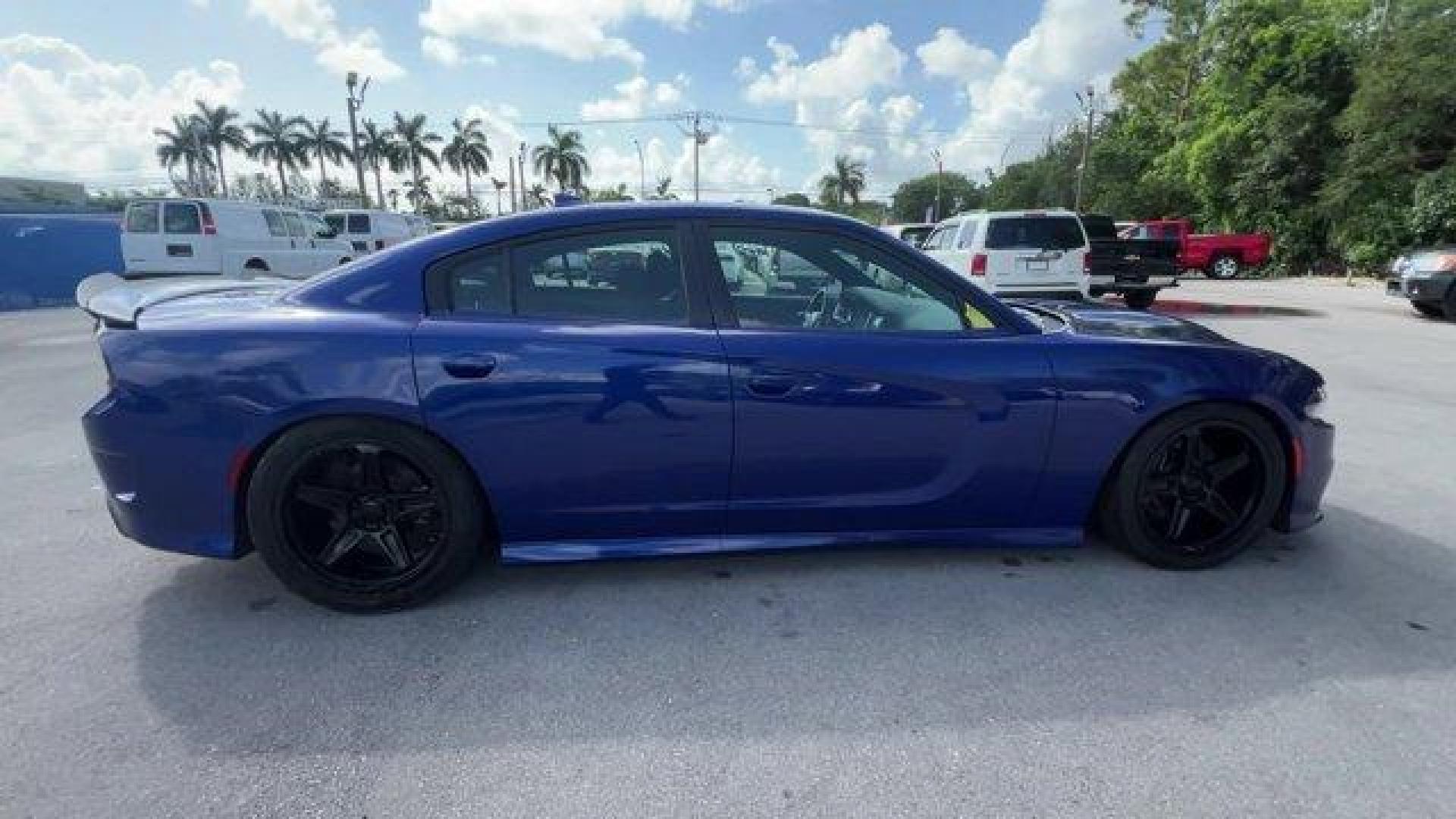 2019 Indigo Blue /Black Dodge Charger (2C3CDXCT5KH) with an 8 5.7 L engine, Automatic transmission, located at 27610 S Dixie Hwy, Homestead, FL, 33032, (305) 749-2348, 25.510241, -80.438301 - KBB.com Best Resale Value Awards. Only 17,596 Miles! Scores 25 Highway MPG and 16 City MPG! This Dodge Charger delivers a Regular Unleaded V-8 5.7 L/345 engine powering this Automatic transmission. WHEELS: 20 X 8.0 GRANITE CRYSTAL ALUMINUM (STD), TRANSMISSION: 8-SPEED AUTOMATIC (8HP70) (STD), TIRES: - Photo#4