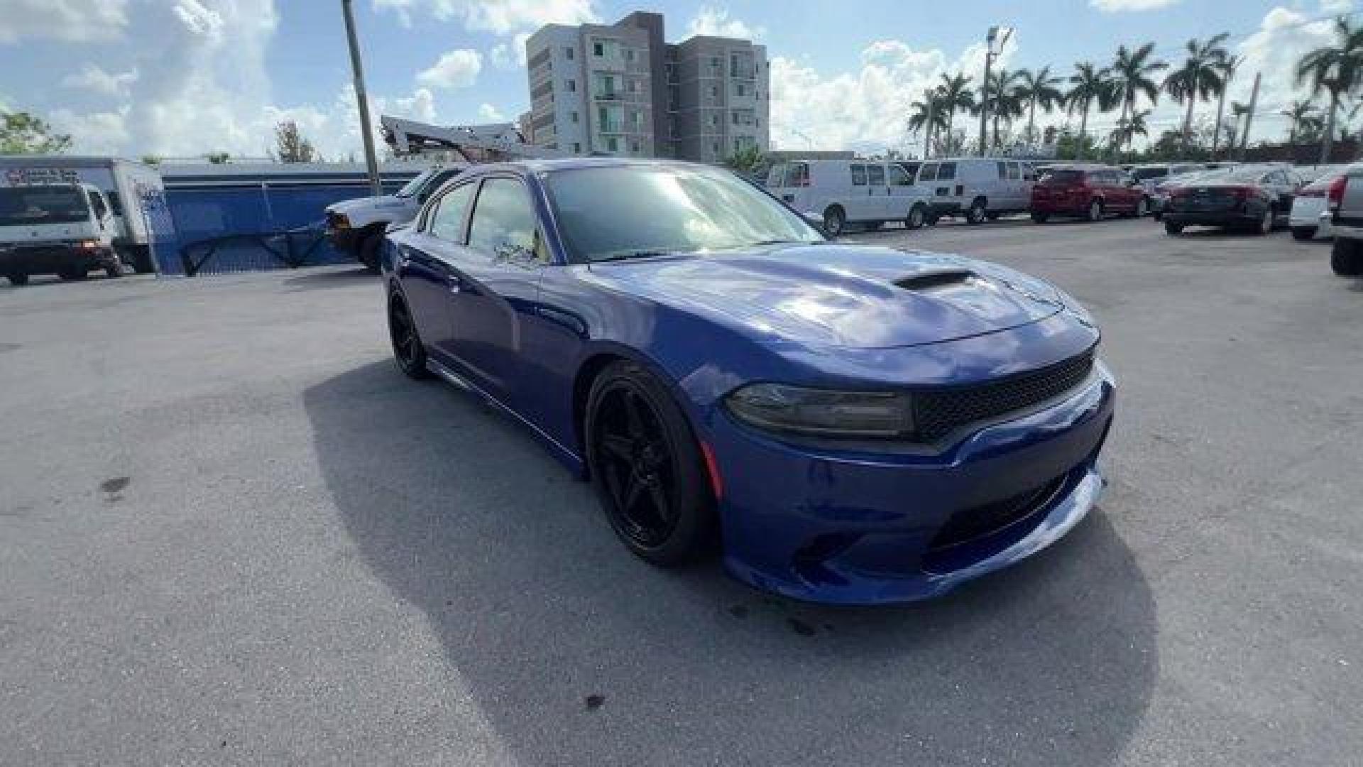 2019 Indigo Blue /Black Dodge Charger (2C3CDXCT5KH) with an 8 5.7 L engine, Automatic transmission, located at 27610 S Dixie Hwy, Homestead, FL, 33032, (305) 749-2348, 25.510241, -80.438301 - KBB.com Best Resale Value Awards. Only 17,596 Miles! Scores 25 Highway MPG and 16 City MPG! This Dodge Charger delivers a Regular Unleaded V-8 5.7 L/345 engine powering this Automatic transmission. WHEELS: 20 X 8.0 GRANITE CRYSTAL ALUMINUM (STD), TRANSMISSION: 8-SPEED AUTOMATIC (8HP70) (STD), TIRES: - Photo#5