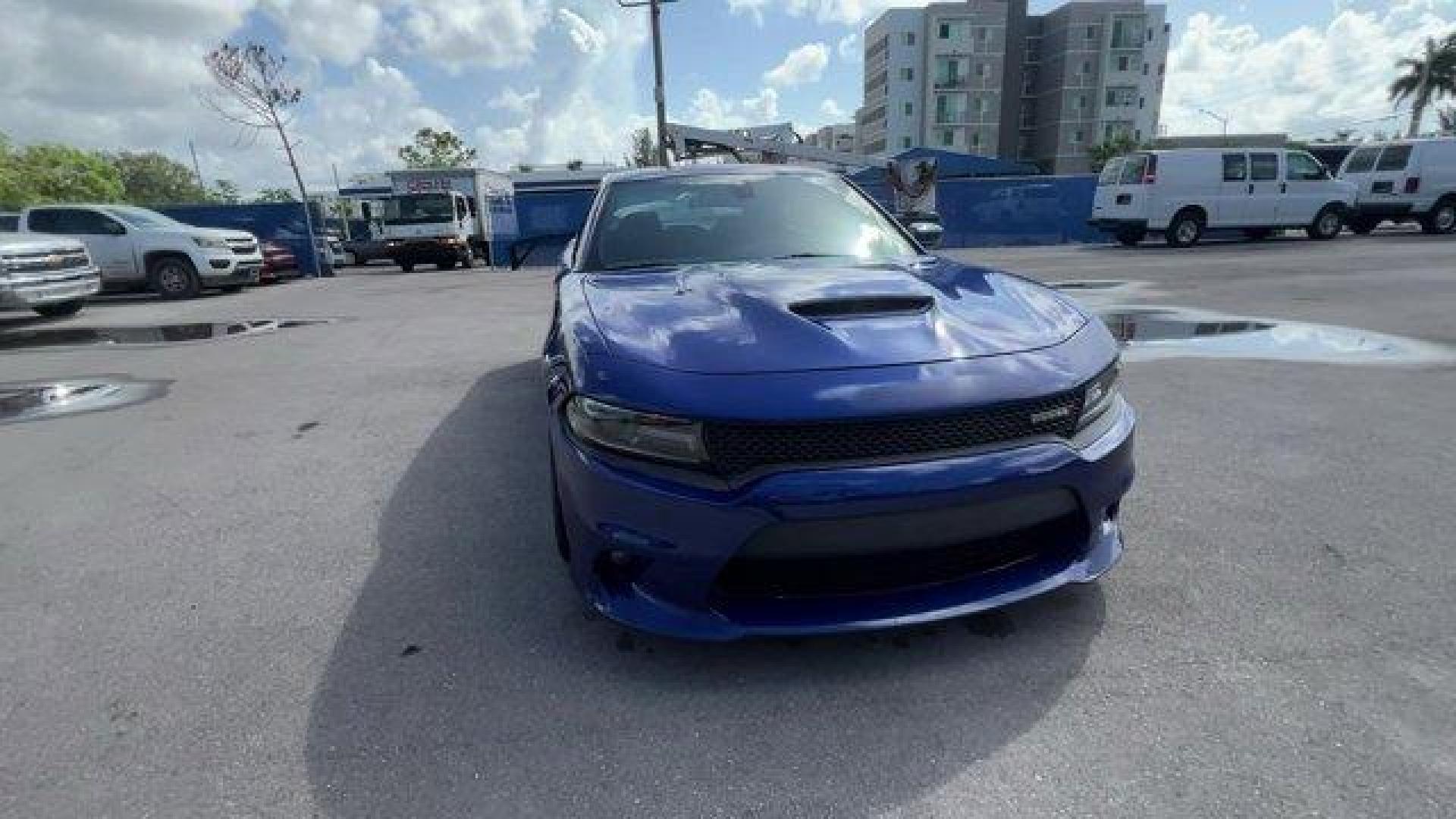 2019 Indigo Blue /Black Dodge Charger (2C3CDXCT5KH) with an 8 5.7 L engine, Automatic transmission, located at 27610 S Dixie Hwy, Homestead, FL, 33032, (305) 749-2348, 25.510241, -80.438301 - KBB.com Best Resale Value Awards. Only 17,596 Miles! Scores 25 Highway MPG and 16 City MPG! This Dodge Charger delivers a Regular Unleaded V-8 5.7 L/345 engine powering this Automatic transmission. WHEELS: 20 X 8.0 GRANITE CRYSTAL ALUMINUM (STD), TRANSMISSION: 8-SPEED AUTOMATIC (8HP70) (STD), TIRES: - Photo#6