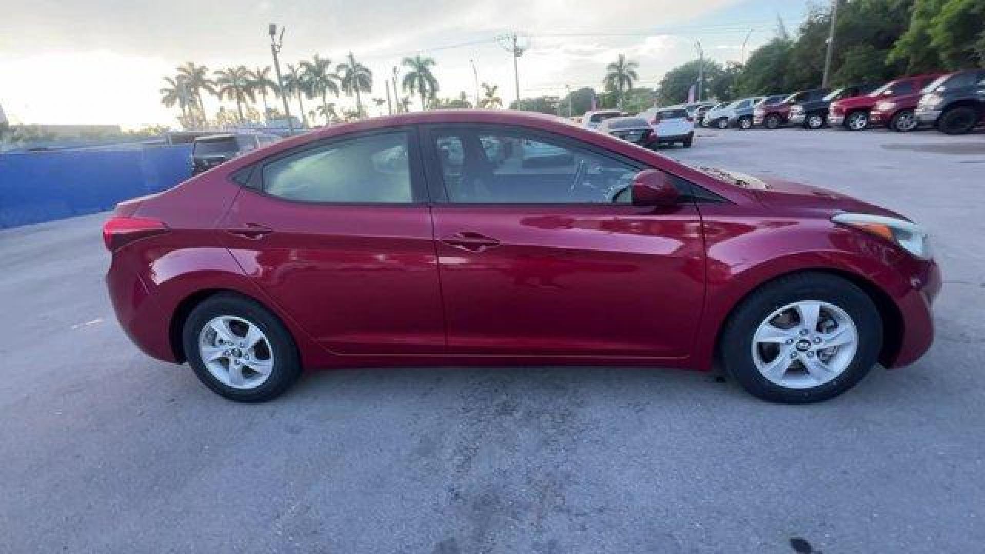 2014 Venetian Red /Gray Hyundai Elantra (5NPDH4AE1EH) with an 4 1.8 L engine, Automatic transmission, located at 27610 S Dixie Hwy, Homestead, FL, 33032, (305) 749-2348, 25.510241, -80.438301 - IIHS Top Safety Pick. Scores 38 Highway MPG and 28 City MPG! This Hyundai Elantra boasts a Regular Unleaded I-4 1.8 L/110 engine powering this Automatic transmission. VENETIAN RED, OPTION GROUP 1, GRAY, PREMIUM CLOTH SEAT TRIM.* This Hyundai Elantra Features the Following Options *Window Grid Antenn - Photo#5