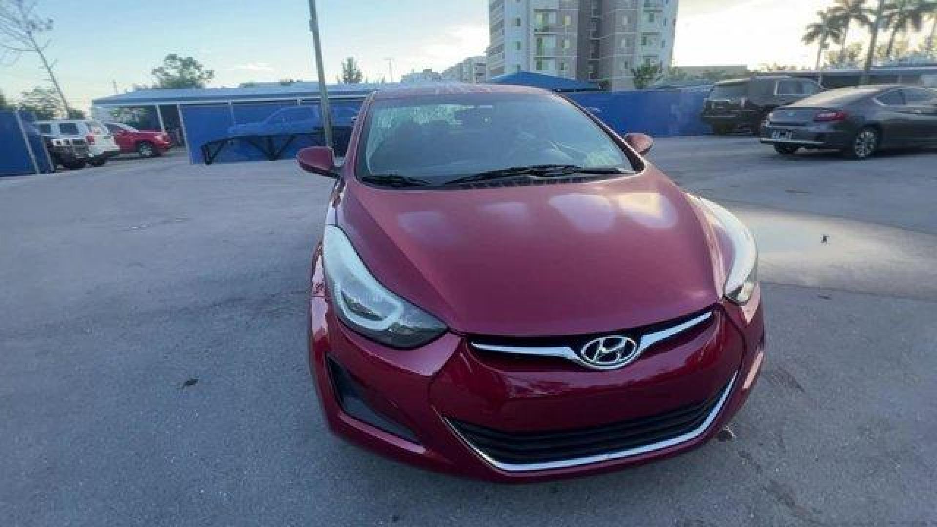 2014 Venetian Red /Gray Hyundai Elantra (5NPDH4AE1EH) with an 4 1.8 L engine, Automatic transmission, located at 27610 S Dixie Hwy, Homestead, FL, 33032, (305) 749-2348, 25.510241, -80.438301 - IIHS Top Safety Pick. Scores 38 Highway MPG and 28 City MPG! This Hyundai Elantra boasts a Regular Unleaded I-4 1.8 L/110 engine powering this Automatic transmission. VENETIAN RED, OPTION GROUP 1, GRAY, PREMIUM CLOTH SEAT TRIM.* This Hyundai Elantra Features the Following Options *Window Grid Antenn - Photo#7