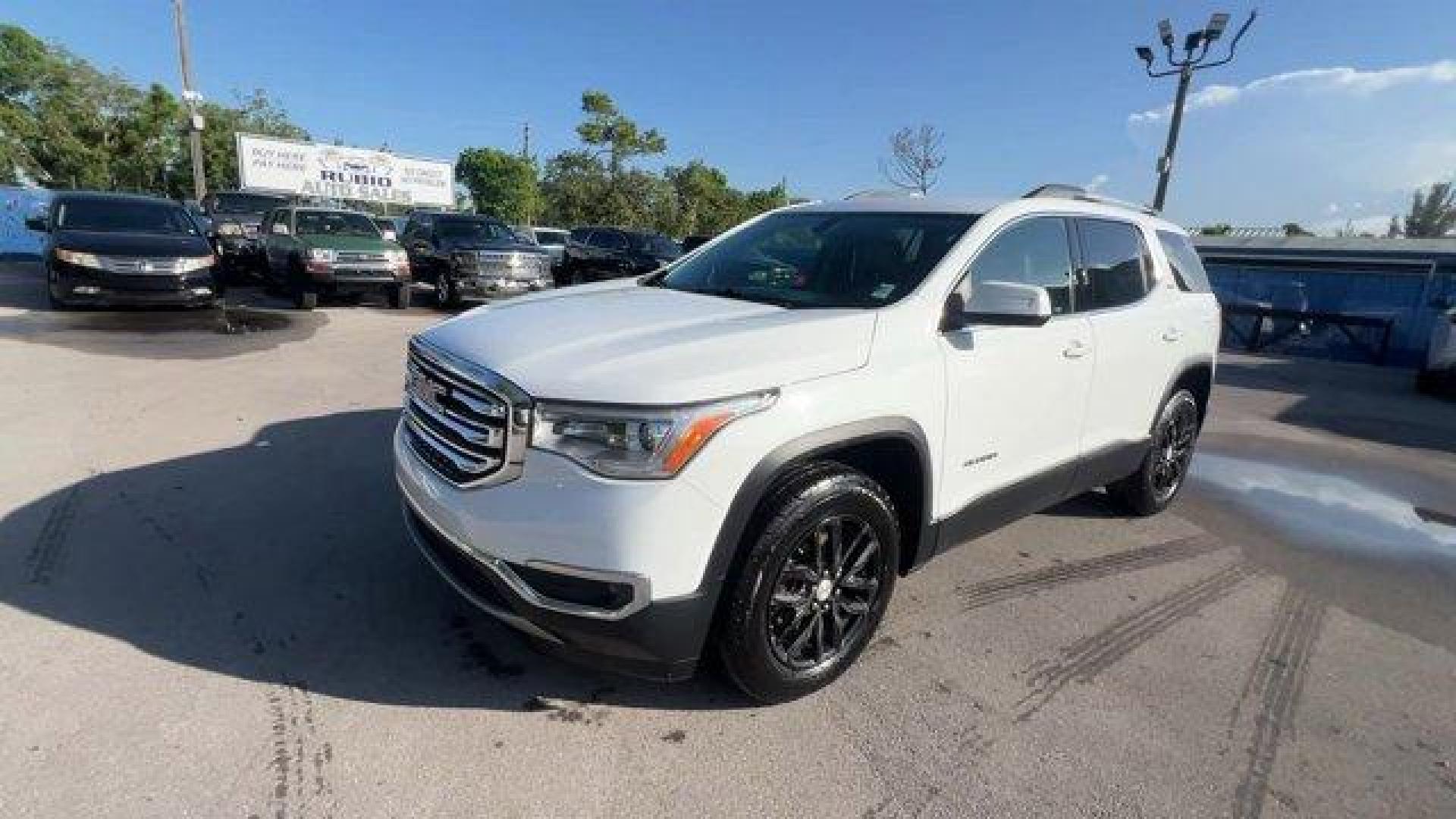 2018 Summit White /Cocoa/ Light Ash Gray GMC Acadia (1GKKNMLS3JZ) with an 6 3.6L engine, Automatic transmission, located at 27610 S Dixie Hwy, Homestead, FL, 33032, (305) 749-2348, 25.510241, -80.438301 - KBB.com 10 Most Affordable 3-Row Vehicles. Boasts 25 Highway MPG and 18 City MPG! This GMC Acadia boasts a Gas V6 3.6L/223 engine powering this Automatic transmission. WHEELS, 4 - 18 X 7.5 (45.7 CM X 19.1 CM) ALUMINUM (STD), TRANSMISSION, 6-SPEED AUTOMATIC, TIRES, P235/65R18 ALL-SEASON, H-RATED, BLA - Photo#0