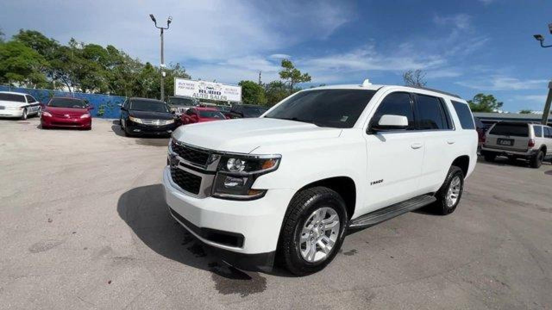 2017 Summit White /Cocoa/Dune Chevrolet Tahoe (1GNSCBKCXHR) with an 8 5.3L engine, Automatic transmission, located at 27610 S Dixie Hwy, Homestead, FL, 33032, (305) 749-2348, 25.510241, -80.438301 - KBB.com 5-Year Cost to Own Awards. Delivers 23 Highway MPG and 16 City MPG! This Chevrolet Tahoe delivers a Gas/Ethanol V8 5.3L/325 engine powering this Automatic transmission. WHEELS, 18 X 8.5 (45.7 CM X 21.6 CM) ALUMINUM WITH HIGH-POLISHED FINISH (STD), TRANSMISSION, 6-SPEED AUTOMATIC, ELECTRONICA - Photo#0