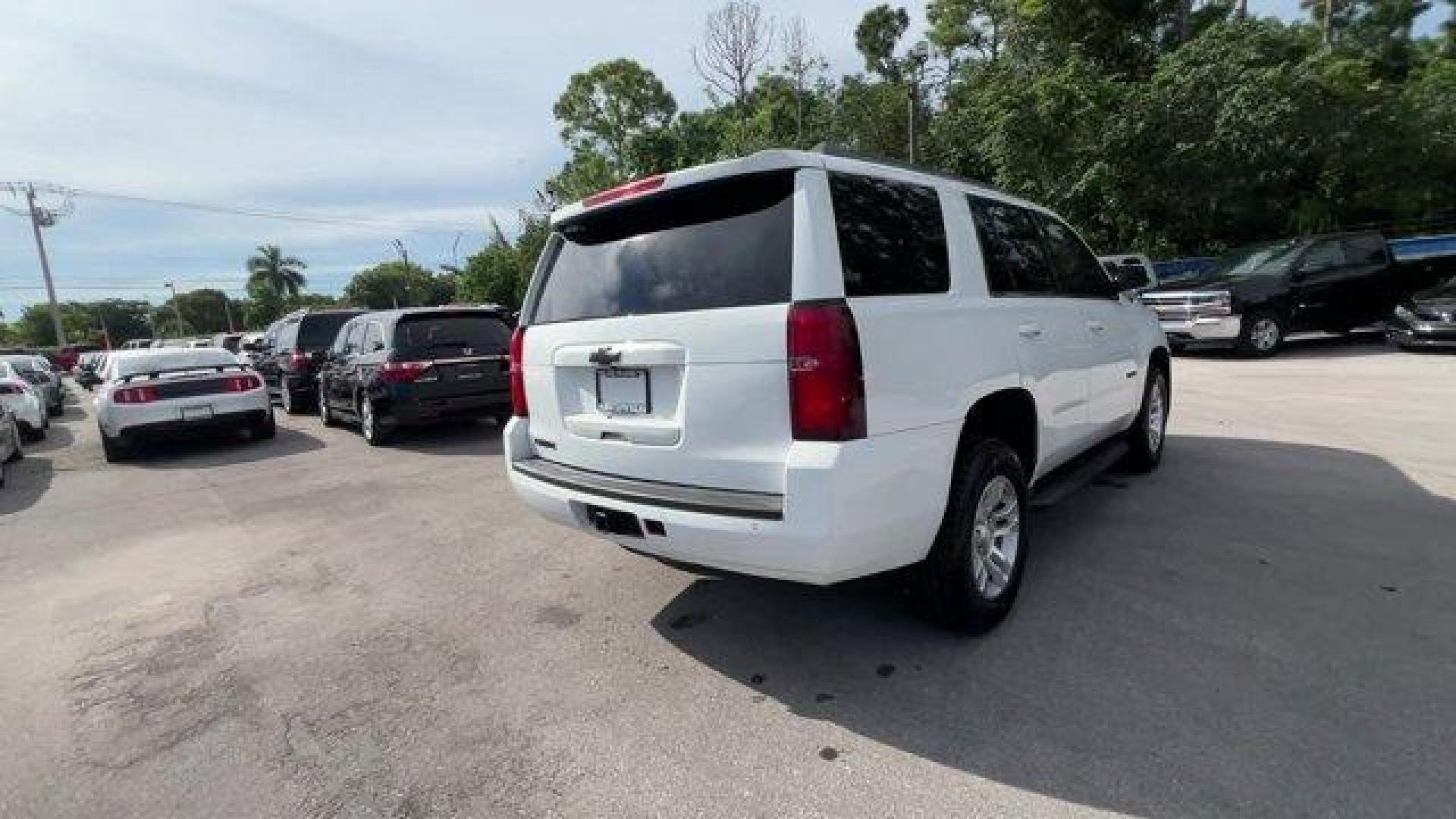 2017 Summit White /Cocoa/Dune Chevrolet Tahoe (1GNSCBKCXHR) with an 8 5.3L engine, Automatic transmission, located at 27610 S Dixie Hwy, Homestead, FL, 33032, (305) 749-2348, 25.510241, -80.438301 - KBB.com 5-Year Cost to Own Awards. Delivers 23 Highway MPG and 16 City MPG! This Chevrolet Tahoe delivers a Gas/Ethanol V8 5.3L/325 engine powering this Automatic transmission. WHEELS, 18 X 8.5 (45.7 CM X 21.6 CM) ALUMINUM WITH HIGH-POLISHED FINISH (STD), TRANSMISSION, 6-SPEED AUTOMATIC, ELECTRONICA - Photo#4