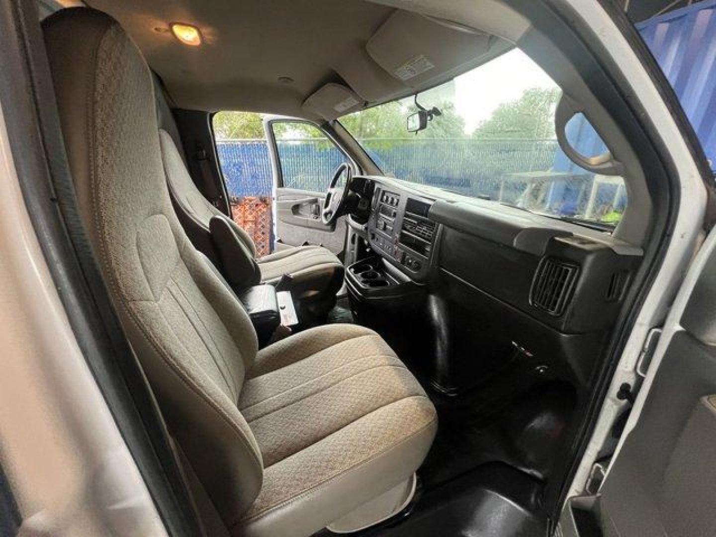 2015 Summit White /Medium Pewter Chevrolet Express Cargo Van (1GCWGFCF4F1) with an 8 4.8L engine, Automatic transmission, located at 27610 S Dixie Hwy, Homestead, FL, 33032, (305) 749-2348, 25.510241, -80.438301 - This Chevrolet Express Cargo Van delivers a Gas V8 4.8L/293 engine powering this Automatic transmission. TRANSMISSION, 6-SPEED AUTOMATIC, HEAVY-DUTY, ELECTRONICALLY CONTROLLED with overdrive tow/haul mode and internal transmission oil cooler (STD), TRAILERING EQUIPMENT, HEAVY-DUTY includes trailerin - Photo#11