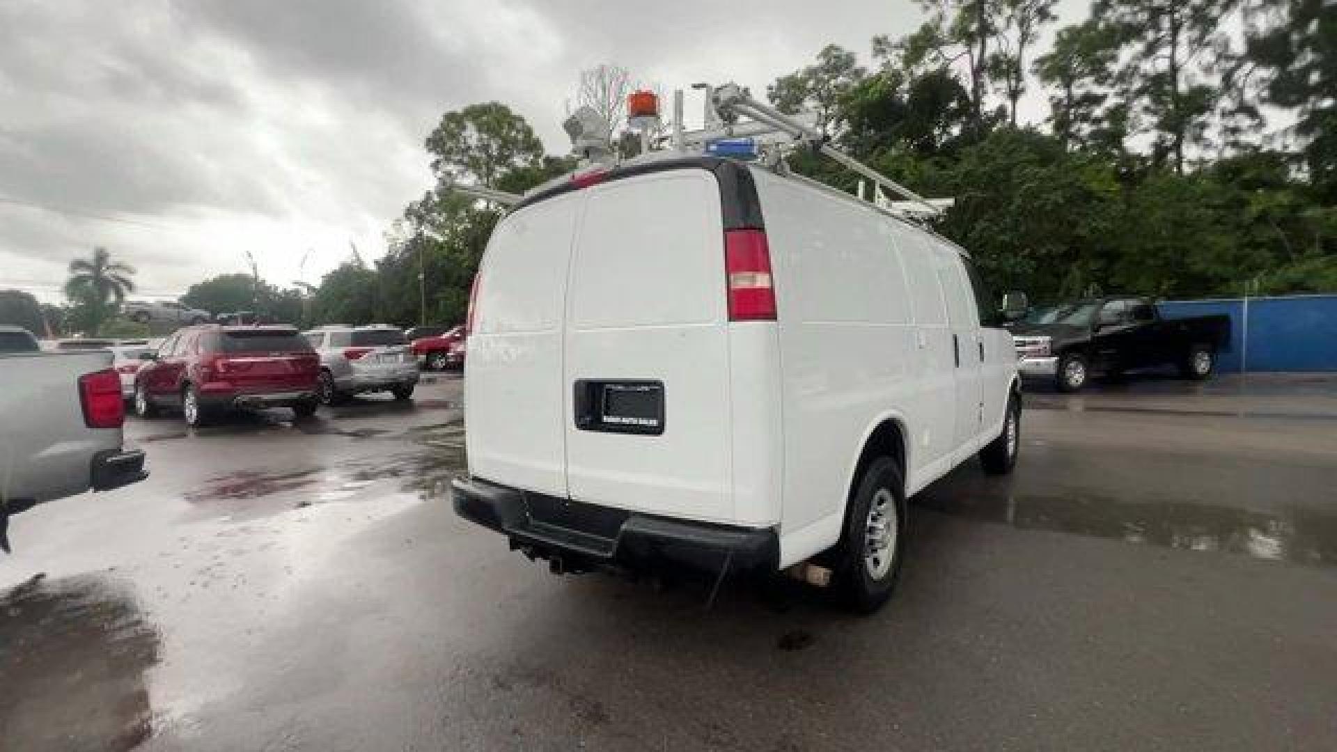 2015 Summit White /Medium Pewter Chevrolet Express Cargo Van (1GCWGFCF4F1) with an 8 4.8L engine, Automatic transmission, located at 27610 S Dixie Hwy, Homestead, FL, 33032, (305) 749-2348, 25.510241, -80.438301 - This Chevrolet Express Cargo Van delivers a Gas V8 4.8L/293 engine powering this Automatic transmission. TRANSMISSION, 6-SPEED AUTOMATIC, HEAVY-DUTY, ELECTRONICALLY CONTROLLED with overdrive tow/haul mode and internal transmission oil cooler (STD), TRAILERING EQUIPMENT, HEAVY-DUTY includes trailerin - Photo#4