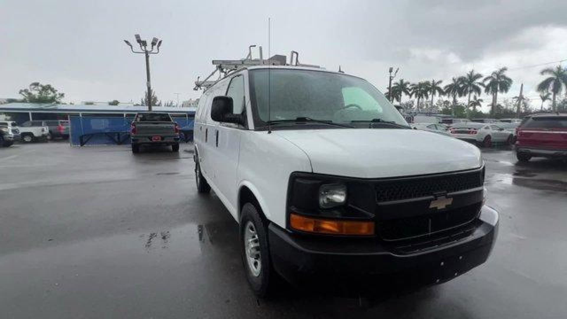 2015 Summit White /Medium Pewter Chevrolet Express Cargo Van (1GCWGFCF4F1) with an 8 4.8L engine, Automatic transmission, located at 27610 S Dixie Hwy, Homestead, FL, 33032, (305) 749-2348, 25.510241, -80.438301 - This Chevrolet Express Cargo Van delivers a Gas V8 4.8L/293 engine powering this Automatic transmission. TRANSMISSION, 6-SPEED AUTOMATIC, HEAVY-DUTY, ELECTRONICALLY CONTROLLED with overdrive tow/haul mode and internal transmission oil cooler (STD), TRAILERING EQUIPMENT, HEAVY-DUTY includes trailerin - Photo#6