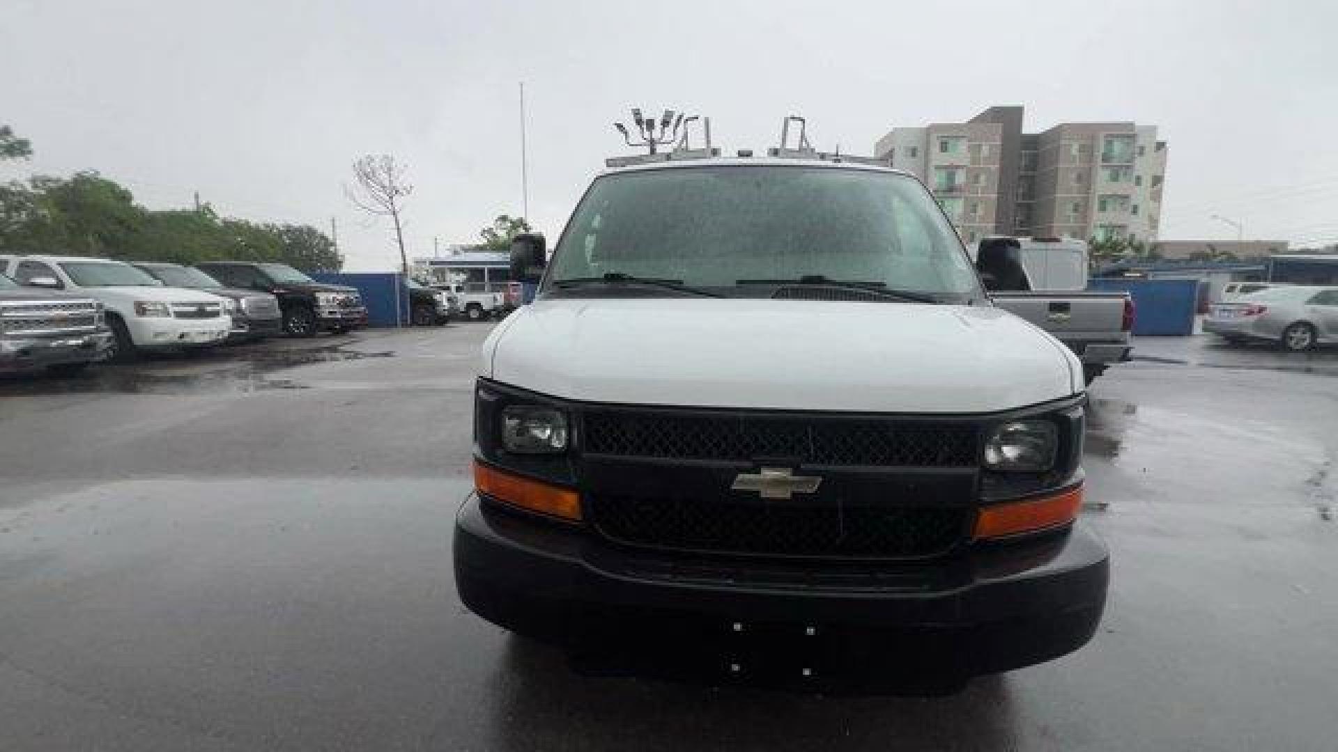 2015 Summit White /Medium Pewter Chevrolet Express Cargo Van (1GCWGFCF4F1) with an 8 4.8L engine, Automatic transmission, located at 27610 S Dixie Hwy, Homestead, FL, 33032, (305) 749-2348, 25.510241, -80.438301 - This Chevrolet Express Cargo Van delivers a Gas V8 4.8L/293 engine powering this Automatic transmission. TRANSMISSION, 6-SPEED AUTOMATIC, HEAVY-DUTY, ELECTRONICALLY CONTROLLED with overdrive tow/haul mode and internal transmission oil cooler (STD), TRAILERING EQUIPMENT, HEAVY-DUTY includes trailerin - Photo#7