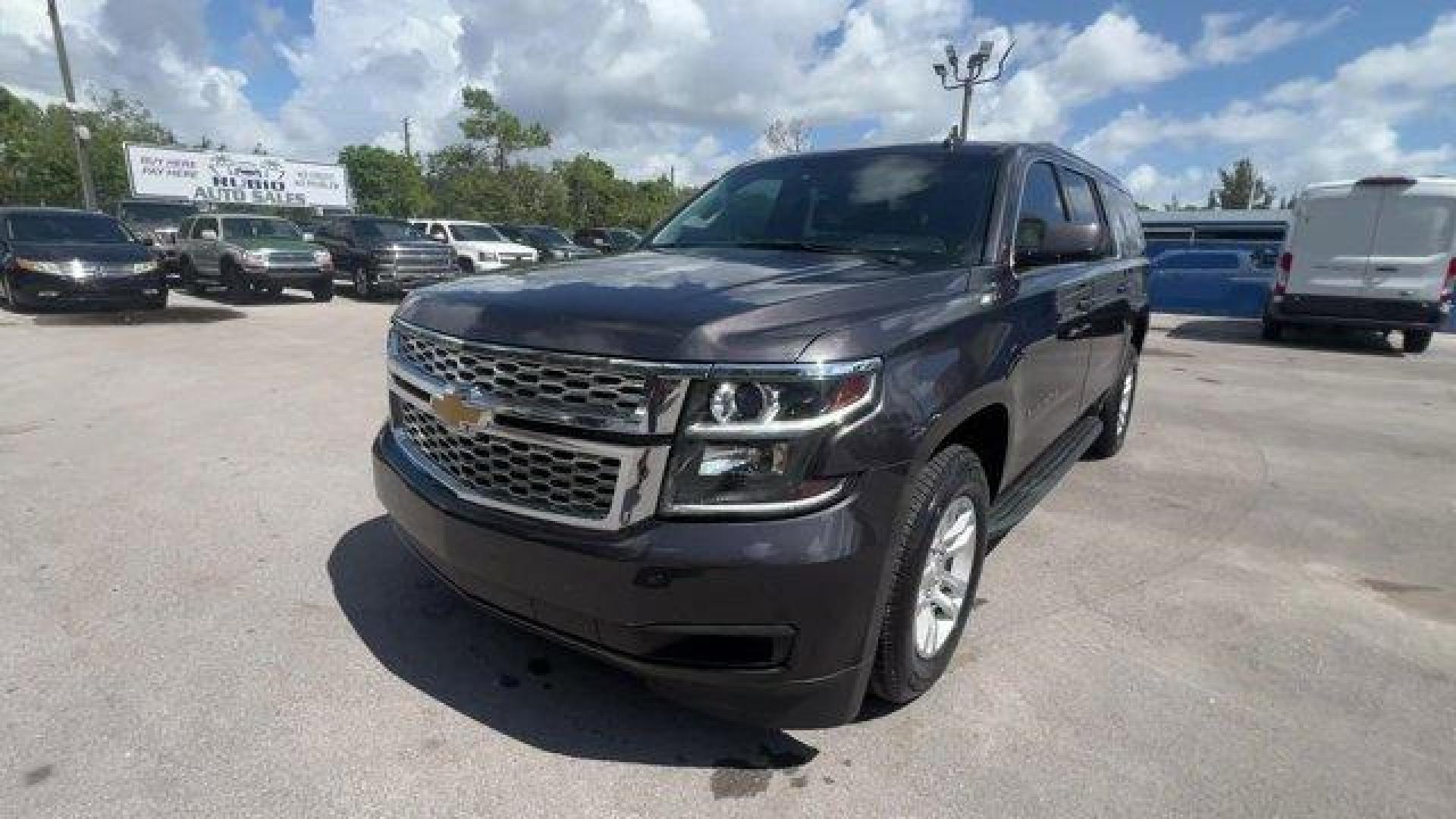 2016 Tungsten Metallic /Jet Black Chevrolet Suburban (1GNSKHKC2GR) with an 8 5.3L engine, Automatic transmission, located at 27610 S Dixie Hwy, Homestead, FL, 33032, (305) 749-2348, 25.510241, -80.438301 - Scores 22 Highway MPG and 15 City MPG! This Chevrolet Suburban boasts a Gas/Ethanol V8 5.3L/ engine powering this Automatic transmission. WHEELS, 18 X 8.5 (45.7 CM X 21.6 CM) ALUMINUM WITH HIGH-POLISHED FINISH (STD), TUNGSTEN METALLIC, TRANSMISSION, 6-SPEED AUTOMATIC, ELECTRONICALLY CONTROLLED with - Photo#0