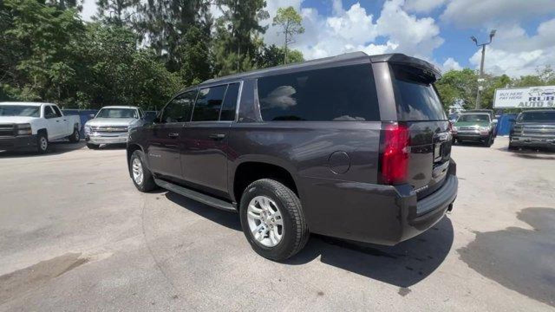 2016 Tungsten Metallic /Jet Black Chevrolet Suburban (1GNSKHKC2GR) with an 8 5.3L engine, Automatic transmission, located at 27610 S Dixie Hwy, Homestead, FL, 33032, (305) 749-2348, 25.510241, -80.438301 - Scores 22 Highway MPG and 15 City MPG! This Chevrolet Suburban boasts a Gas/Ethanol V8 5.3L/ engine powering this Automatic transmission. WHEELS, 18 X 8.5 (45.7 CM X 21.6 CM) ALUMINUM WITH HIGH-POLISHED FINISH (STD), TUNGSTEN METALLIC, TRANSMISSION, 6-SPEED AUTOMATIC, ELECTRONICALLY CONTROLLED with - Photo#2