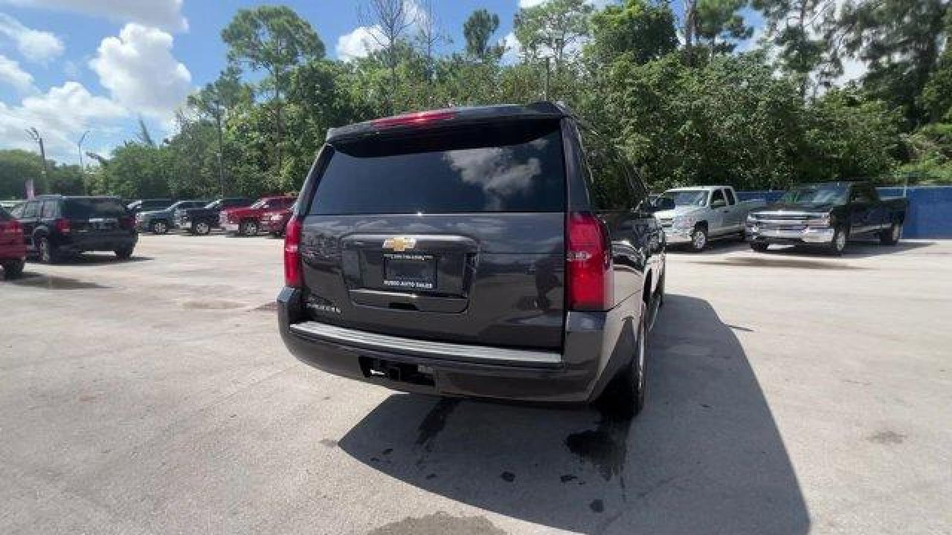 2016 Tungsten Metallic /Jet Black Chevrolet Suburban (1GNSKHKC2GR) with an 8 5.3L engine, Automatic transmission, located at 27610 S Dixie Hwy, Homestead, FL, 33032, (305) 749-2348, 25.510241, -80.438301 - Scores 22 Highway MPG and 15 City MPG! This Chevrolet Suburban boasts a Gas/Ethanol V8 5.3L/ engine powering this Automatic transmission. WHEELS, 18 X 8.5 (45.7 CM X 21.6 CM) ALUMINUM WITH HIGH-POLISHED FINISH (STD), TUNGSTEN METALLIC, TRANSMISSION, 6-SPEED AUTOMATIC, ELECTRONICALLY CONTROLLED with - Photo#4