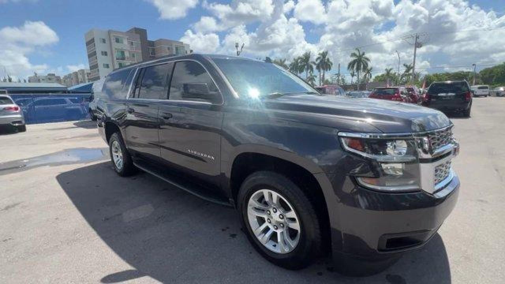 2016 Tungsten Metallic /Jet Black Chevrolet Suburban (1GNSKHKC2GR) with an 8 5.3L engine, Automatic transmission, located at 27610 S Dixie Hwy, Homestead, FL, 33032, (305) 749-2348, 25.510241, -80.438301 - Scores 22 Highway MPG and 15 City MPG! This Chevrolet Suburban boasts a Gas/Ethanol V8 5.3L/ engine powering this Automatic transmission. WHEELS, 18 X 8.5 (45.7 CM X 21.6 CM) ALUMINUM WITH HIGH-POLISHED FINISH (STD), TUNGSTEN METALLIC, TRANSMISSION, 6-SPEED AUTOMATIC, ELECTRONICALLY CONTROLLED with - Photo#6