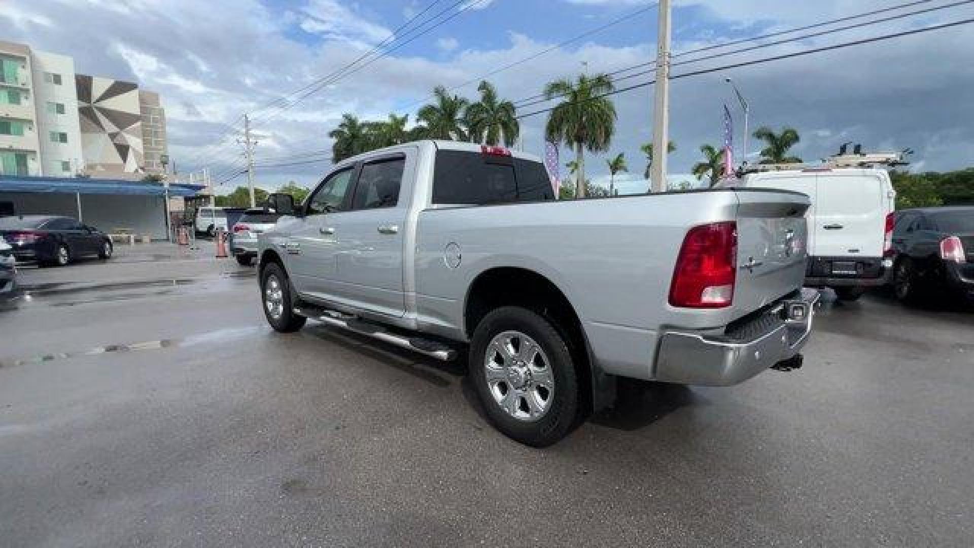 2016 Bright Silver Metallic Clearcoat /Diesel Gray/Black Ram 2500 (3C6UR4DJ4GG) with an 8 6.4 L engine, Automatic transmission, located at 27610 S Dixie Hwy, Homestead, FL, 33032, (305) 749-2348, 25.510241, -80.438301 - This Ram 2500 boasts a Regular Unleaded V-8 6.4 L/392 engine powering this Automatic transmission. WHEELS: 20 X 8.0 PAINTED ALUMINUM W/CHROME INSERTS -inc: Tires: LT285/60R20E OWL On/Off Road, TRANSMISSION: 6-SPEED AUTOMATIC (66RFE) (STD), TOW HOOKS.* This Ram 2500 Features the Following Options *QU - Photo#2