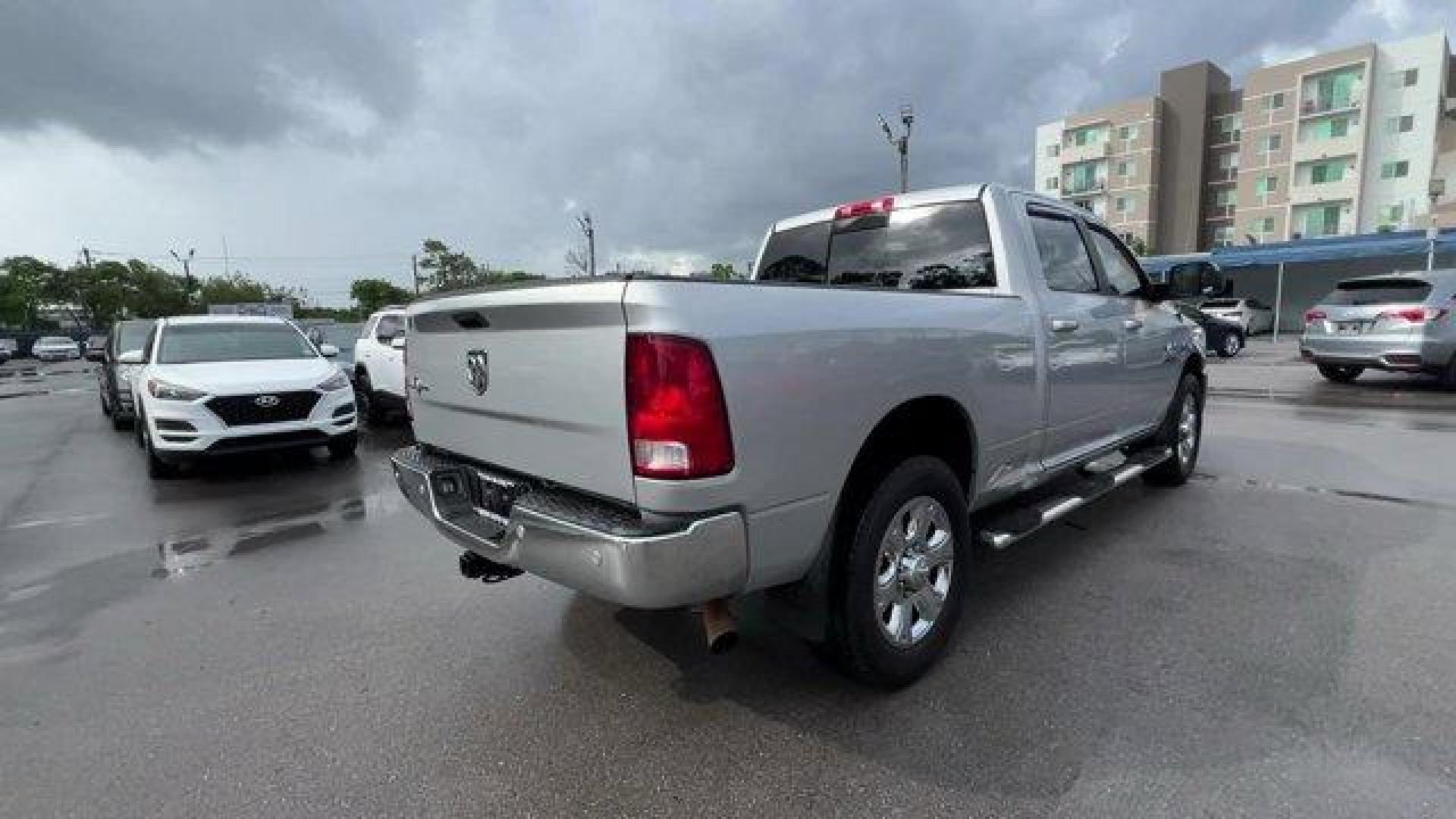 2016 Bright Silver Metallic Clearcoat /Diesel Gray/Black Ram 2500 (3C6UR4DJ4GG) with an 8 6.4 L engine, Automatic transmission, located at 27610 S Dixie Hwy, Homestead, FL, 33032, (305) 749-2348, 25.510241, -80.438301 - This Ram 2500 boasts a Regular Unleaded V-8 6.4 L/392 engine powering this Automatic transmission. WHEELS: 20 X 8.0 PAINTED ALUMINUM W/CHROME INSERTS -inc: Tires: LT285/60R20E OWL On/Off Road, TRANSMISSION: 6-SPEED AUTOMATIC (66RFE) (STD), TOW HOOKS.* This Ram 2500 Features the Following Options *QU - Photo#4