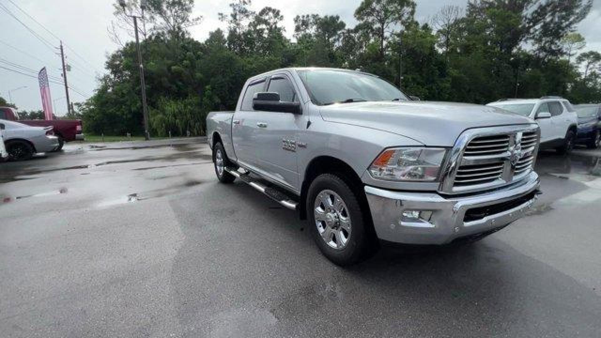 2016 Bright Silver Metallic Clearcoat /Diesel Gray/Black Ram 2500 (3C6UR4DJ4GG) with an 8 6.4 L engine, Automatic transmission, located at 27610 S Dixie Hwy, Homestead, FL, 33032, (305) 749-2348, 25.510241, -80.438301 - This Ram 2500 boasts a Regular Unleaded V-8 6.4 L/392 engine powering this Automatic transmission. WHEELS: 20 X 8.0 PAINTED ALUMINUM W/CHROME INSERTS -inc: Tires: LT285/60R20E OWL On/Off Road, TRANSMISSION: 6-SPEED AUTOMATIC (66RFE) (STD), TOW HOOKS.* This Ram 2500 Features the Following Options *QU - Photo#6