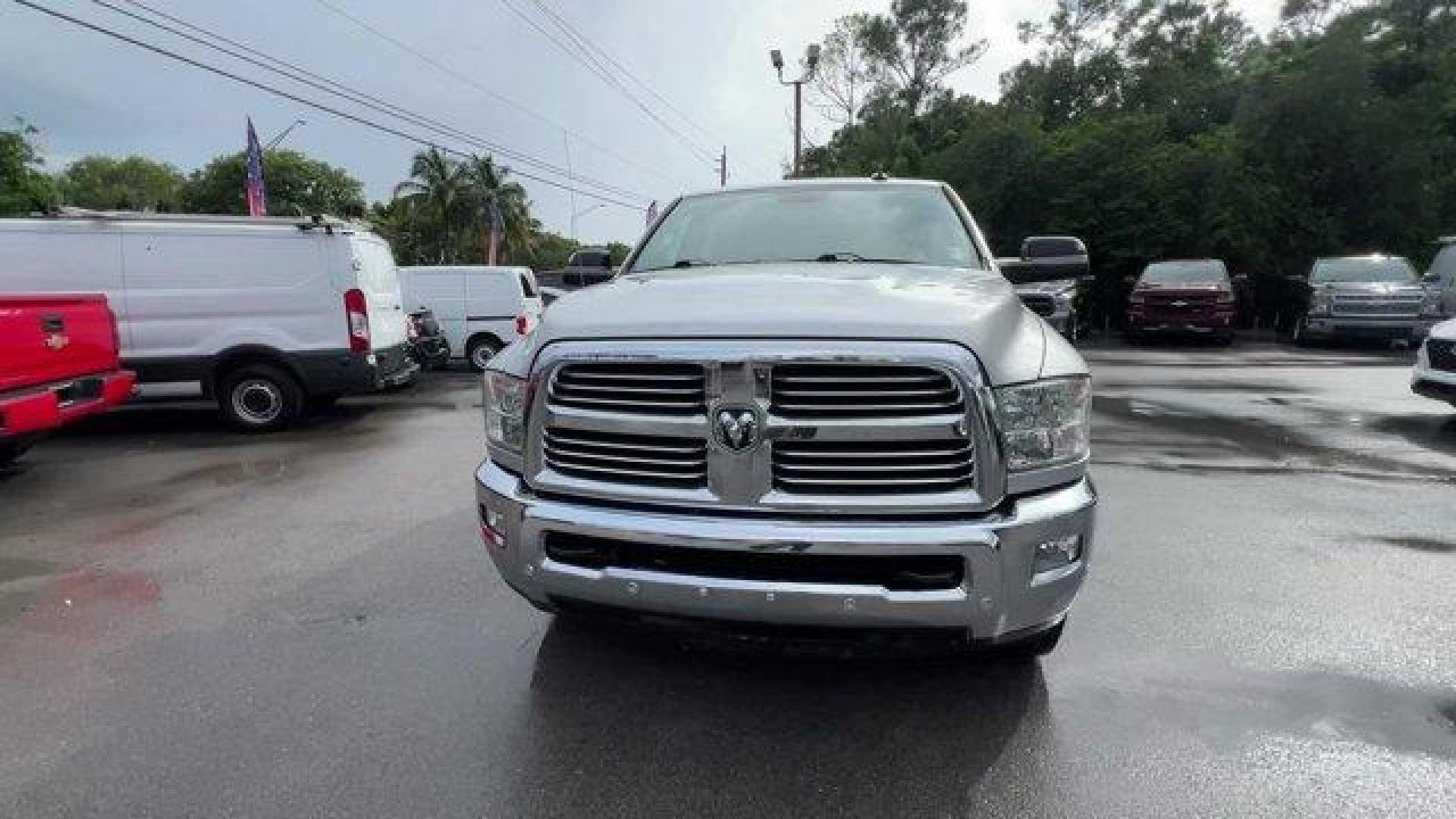 2016 Bright Silver Metallic Clearcoat /Diesel Gray/Black Ram 2500 (3C6UR4DJ4GG) with an 8 6.4 L engine, Automatic transmission, located at 27610 S Dixie Hwy, Homestead, FL, 33032, (305) 749-2348, 25.510241, -80.438301 - This Ram 2500 boasts a Regular Unleaded V-8 6.4 L/392 engine powering this Automatic transmission. WHEELS: 20 X 8.0 PAINTED ALUMINUM W/CHROME INSERTS -inc: Tires: LT285/60R20E OWL On/Off Road, TRANSMISSION: 6-SPEED AUTOMATIC (66RFE) (STD), TOW HOOKS.* This Ram 2500 Features the Following Options *QU - Photo#7