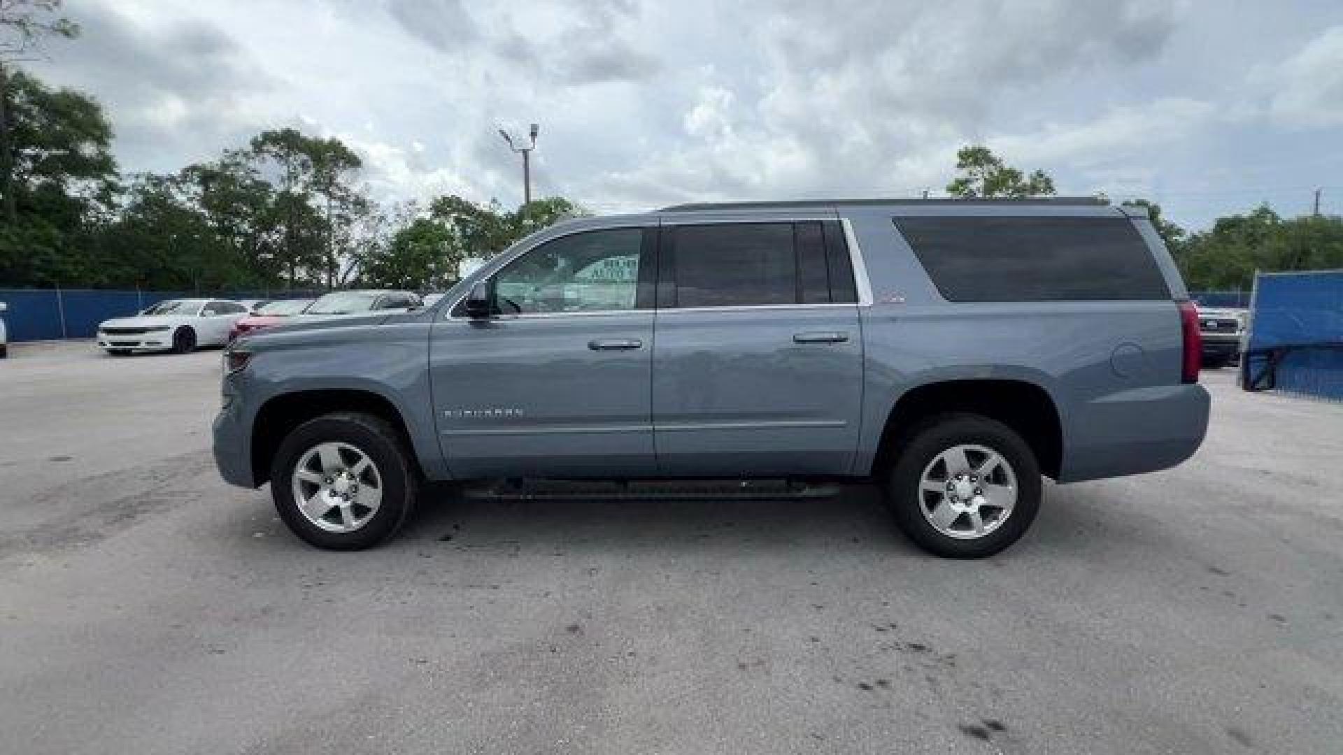 2016 Slate Grey Metallic /Jet Black/Dark Ash Chevrolet Suburban (1GNSKHKCXGR) with an 8 5.3L engine, Automatic transmission, located at 27610 S Dixie Hwy, Homestead, FL, 33032, (305) 749-2348, 25.510241, -80.438301 - Boasts 22 Highway MPG and 15 City MPG! This Chevrolet Suburban boasts a Gas/Ethanol V8 5.3L/ engine powering this Automatic transmission. WIRELESS CHARGING, WHEELS, 18 X 8.5 (45.7 CM X 21.6 CM) PAINTED ALUMINUM, UNDERBODY SHIELD.* This Chevrolet Suburban Features the Following Options *SUN, ENTERTAI - Photo#1