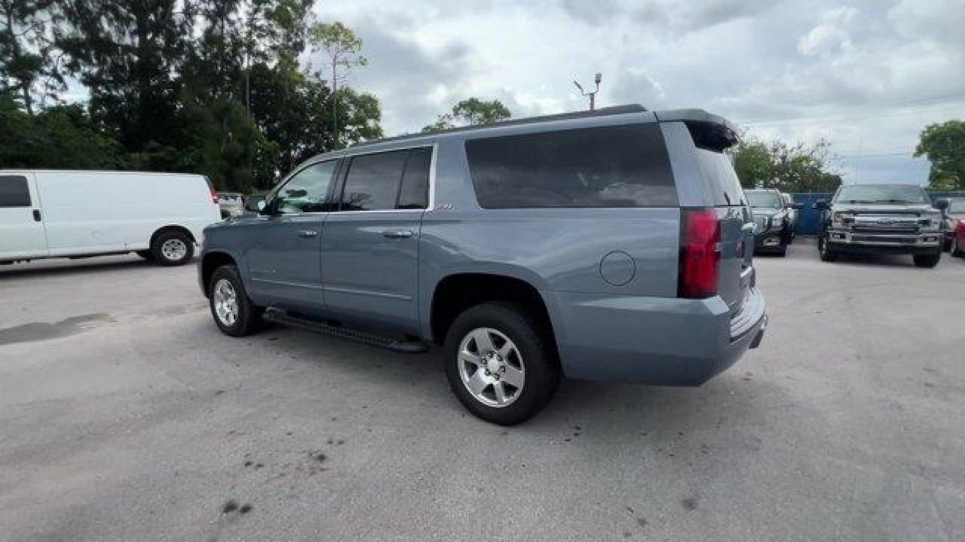 2016 Slate Grey Metallic /Jet Black/Dark Ash Chevrolet Suburban (1GNSKHKCXGR) with an 8 5.3L engine, Automatic transmission, located at 27610 S Dixie Hwy, Homestead, FL, 33032, (305) 749-2348, 25.510241, -80.438301 - Boasts 22 Highway MPG and 15 City MPG! This Chevrolet Suburban boasts a Gas/Ethanol V8 5.3L/ engine powering this Automatic transmission. WIRELESS CHARGING, WHEELS, 18 X 8.5 (45.7 CM X 21.6 CM) PAINTED ALUMINUM, UNDERBODY SHIELD.* This Chevrolet Suburban Features the Following Options *SUN, ENTERTAI - Photo#2