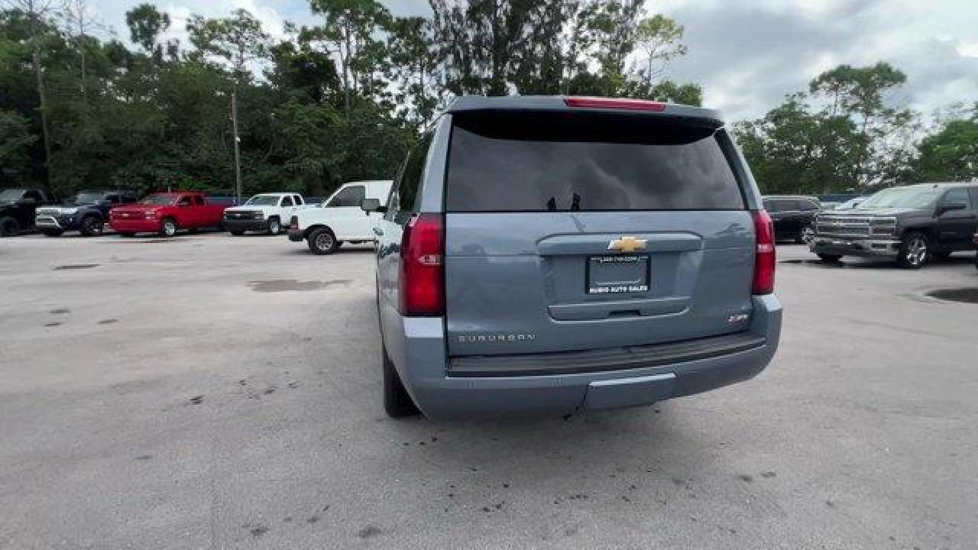 2016 Slate Grey Metallic /Jet Black/Dark Ash Chevrolet Suburban (1GNSKHKCXGR) with an 8 5.3L engine, Automatic transmission, located at 27610 S Dixie Hwy, Homestead, FL, 33032, (305) 749-2348, 25.510241, -80.438301 - Boasts 22 Highway MPG and 15 City MPG! This Chevrolet Suburban boasts a Gas/Ethanol V8 5.3L/ engine powering this Automatic transmission. WIRELESS CHARGING, WHEELS, 18 X 8.5 (45.7 CM X 21.6 CM) PAINTED ALUMINUM, UNDERBODY SHIELD.* This Chevrolet Suburban Features the Following Options *SUN, ENTERTAI - Photo#3