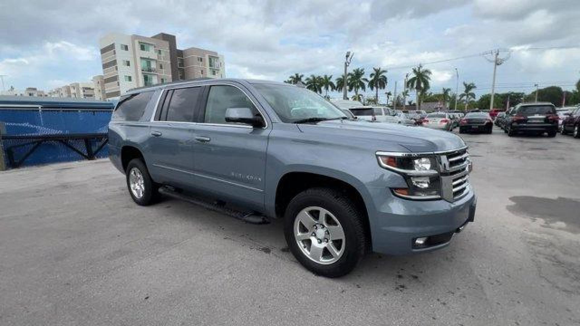 2016 Slate Grey Metallic /Jet Black/Dark Ash Chevrolet Suburban (1GNSKHKCXGR) with an 8 5.3L engine, Automatic transmission, located at 27610 S Dixie Hwy, Homestead, FL, 33032, (305) 749-2348, 25.510241, -80.438301 - Boasts 22 Highway MPG and 15 City MPG! This Chevrolet Suburban boasts a Gas/Ethanol V8 5.3L/ engine powering this Automatic transmission. WIRELESS CHARGING, WHEELS, 18 X 8.5 (45.7 CM X 21.6 CM) PAINTED ALUMINUM, UNDERBODY SHIELD.* This Chevrolet Suburban Features the Following Options *SUN, ENTERTAI - Photo#6