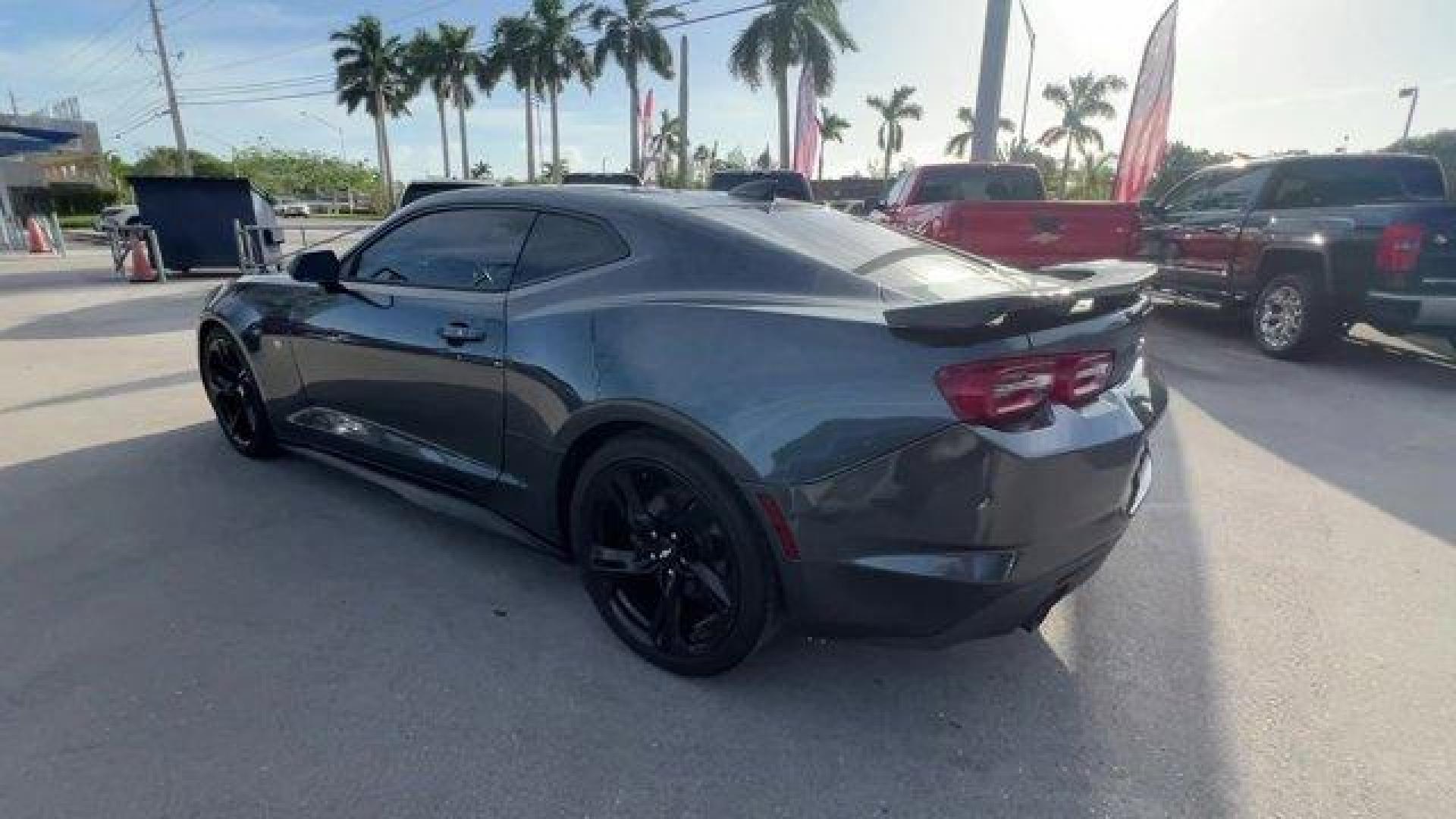 2019 Shadow Gray Metallic /Jet Black Chevrolet Camaro (1G1FB1RXXK0) with an 4 2.0L engine, Automatic transmission, located at 27610 S Dixie Hwy, Homestead, FL, 33032, (305) 749-2348, 25.510241, -80.438301 - KBB.com 10 Coolest Cars Under $30,000. Only 57,139 Miles! Delivers 31 Highway MPG and 22 City MPG! This Chevrolet Camaro boasts a Turbocharged Gas I4 2.0L/122 engine powering this Automatic transmission. WHEELS, 20 (50.8 CM) 5-SPOKE CARBON FLASH PAINTED ALUMINUM, TRANSMISSION, 8-SPEED AUTOMATIC incl - Photo#1