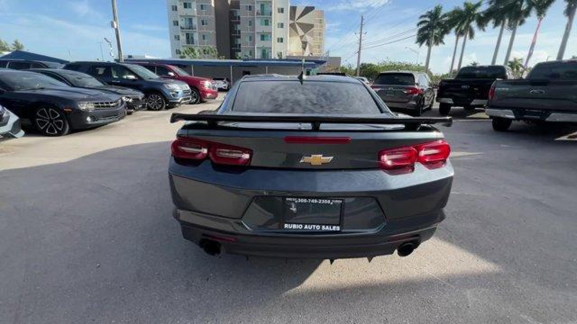 2019 Shadow Gray Metallic /Jet Black Chevrolet Camaro (1G1FB1RXXK0) with an 4 2.0L engine, Automatic transmission, located at 27610 S Dixie Hwy, Homestead, FL, 33032, (305) 749-2348, 25.510241, -80.438301 - KBB.com 10 Coolest Cars Under $30,000. Only 57,139 Miles! Delivers 31 Highway MPG and 22 City MPG! This Chevrolet Camaro boasts a Turbocharged Gas I4 2.0L/122 engine powering this Automatic transmission. WHEELS, 20 (50.8 CM) 5-SPOKE CARBON FLASH PAINTED ALUMINUM, TRANSMISSION, 8-SPEED AUTOMATIC incl - Photo#2