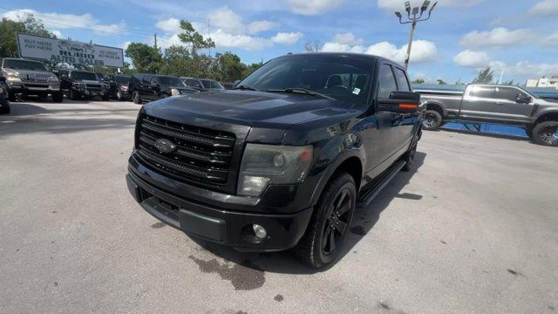 2014 Black Ford F-150 (1FTFW1CF2EF) with an 8 5.0 L engine, Automatic transmission, located at 27610 S Dixie Hwy, Homestead, FL, 33032, (305) 749-2348, 25.510241, -80.438301 - KBB.com Brand Image Awards. Scores 21 Highway MPG and 15 City MPG! This Ford F-150 delivers a Regular Unleaded V-8 5.0 L/302 engine powering this Automatic transmission. Transmission: Electronic 6-Speed Automatic -inc: tow/haul mode, Trailer Wiring Harness, Tailgate Rear Cargo Access.*This Ford F-15 - Photo#0