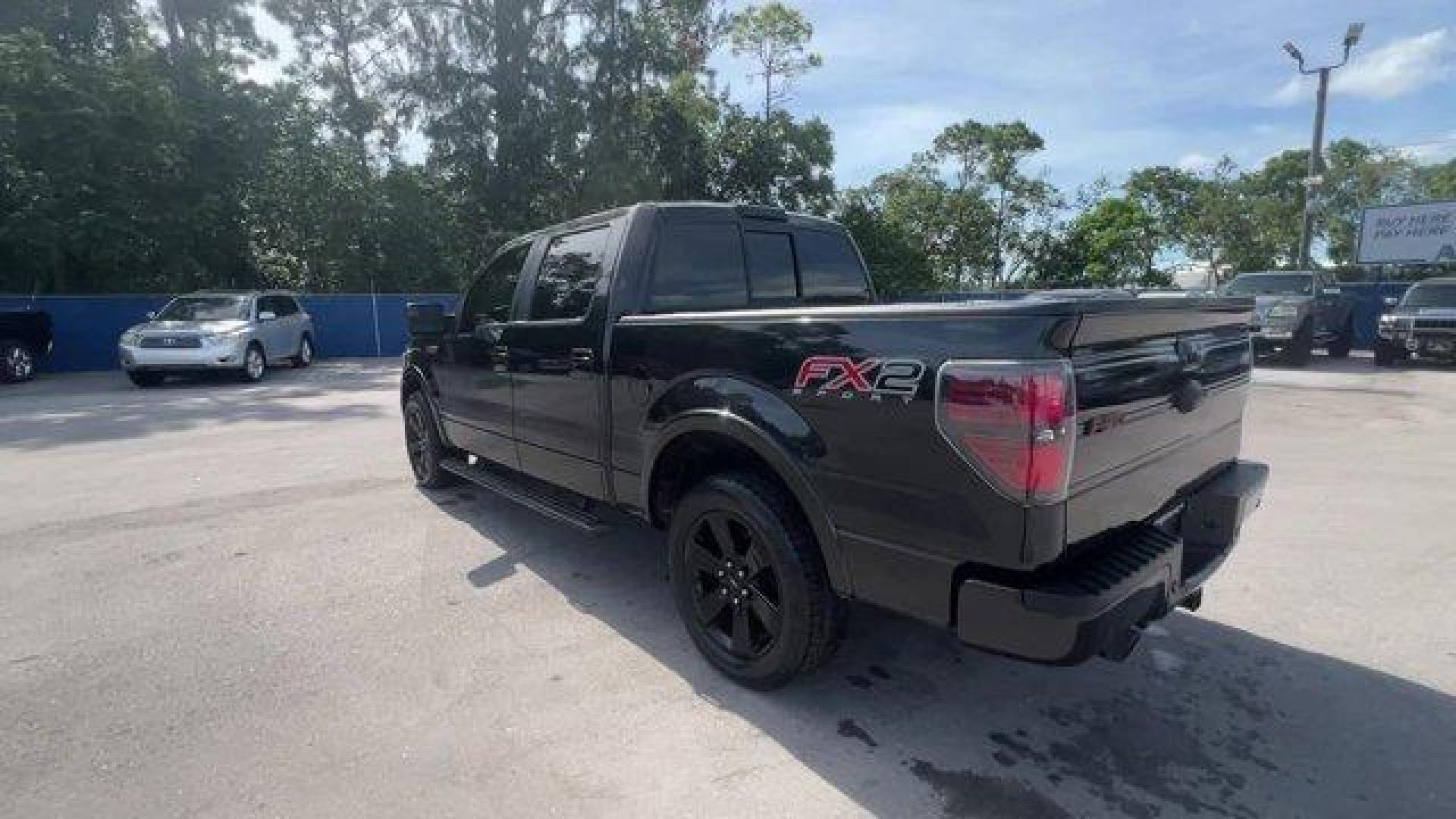 2014 Black Ford F-150 (1FTFW1CF2EF) with an 8 5.0 L engine, Automatic transmission, located at 27610 S Dixie Hwy, Homestead, FL, 33032, (305) 749-2348, 25.510241, -80.438301 - KBB.com Brand Image Awards. Scores 21 Highway MPG and 15 City MPG! This Ford F-150 delivers a Regular Unleaded V-8 5.0 L/302 engine powering this Automatic transmission. Transmission: Electronic 6-Speed Automatic -inc: tow/haul mode, Trailer Wiring Harness, Tailgate Rear Cargo Access.*This Ford F-15 - Photo#2