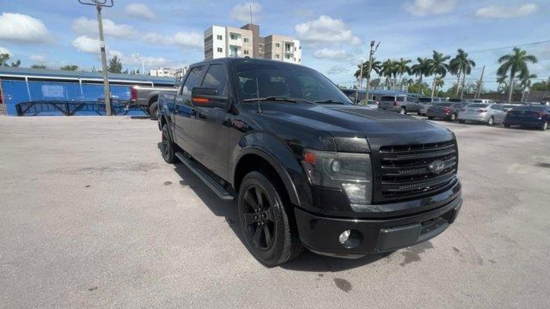 2014 Black Ford F-150 (1FTFW1CF2EF) with an 8 5.0 L engine, Automatic transmission, located at 27610 S Dixie Hwy, Homestead, FL, 33032, (305) 749-2348, 25.510241, -80.438301 - KBB.com Brand Image Awards. Scores 21 Highway MPG and 15 City MPG! This Ford F-150 delivers a Regular Unleaded V-8 5.0 L/302 engine powering this Automatic transmission. Transmission: Electronic 6-Speed Automatic -inc: tow/haul mode, Trailer Wiring Harness, Tailgate Rear Cargo Access.*This Ford F-15 - Photo#6