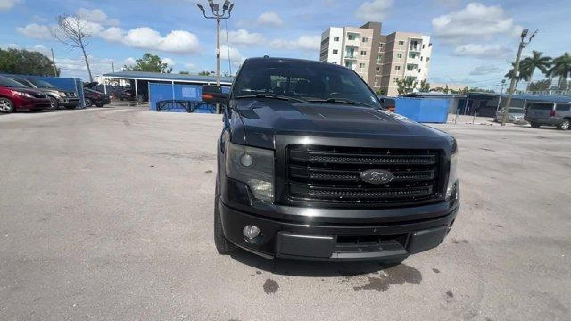 2014 Black Ford F-150 (1FTFW1CF2EF) with an 8 5.0 L engine, Automatic transmission, located at 27610 S Dixie Hwy, Homestead, FL, 33032, (305) 749-2348, 25.510241, -80.438301 - KBB.com Brand Image Awards. Scores 21 Highway MPG and 15 City MPG! This Ford F-150 delivers a Regular Unleaded V-8 5.0 L/302 engine powering this Automatic transmission. Transmission: Electronic 6-Speed Automatic -inc: tow/haul mode, Trailer Wiring Harness, Tailgate Rear Cargo Access.*This Ford F-15 - Photo#7