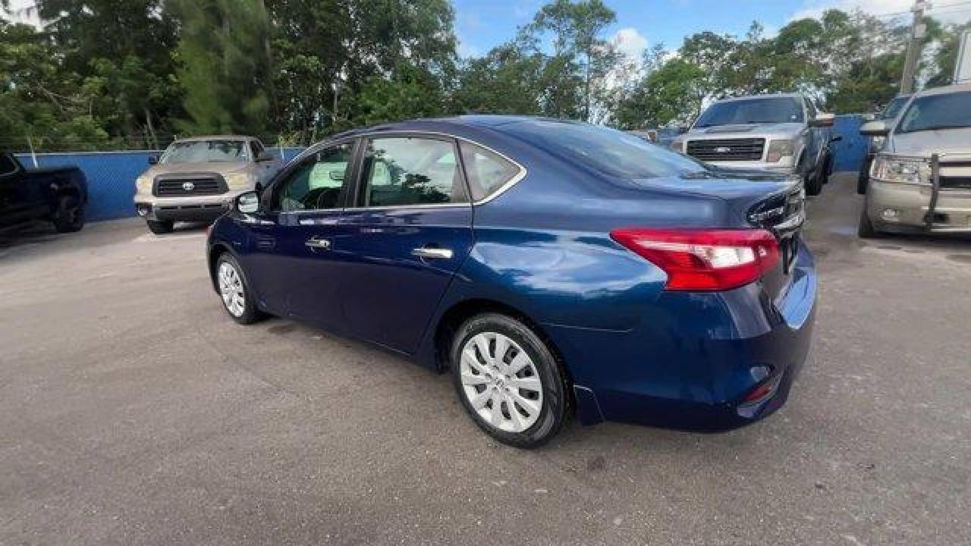 2019 Deep Blue Pearl /Charcoal Nissan Sentra (3N1AB7APXKY) with an 4 1.8 L engine, Variable transmission, located at 27610 S Dixie Hwy, Homestead, FL, 33032, (305) 749-2348, 25.510241, -80.438301 - Only 56,174 Miles! Boasts 37 Highway MPG and 29 City MPG! This Nissan Sentra boasts a Regular Unleaded I-4 1.8 L/110 engine powering this Variable transmission. DEEP BLUE PEARL, CHARCOAL, CLOTH SEAT TRIM, [L92] CARPETED FLOOR MATS W/TRUNK MAT.*This Nissan Sentra Comes Equipped with These Options *Wi - Photo#2