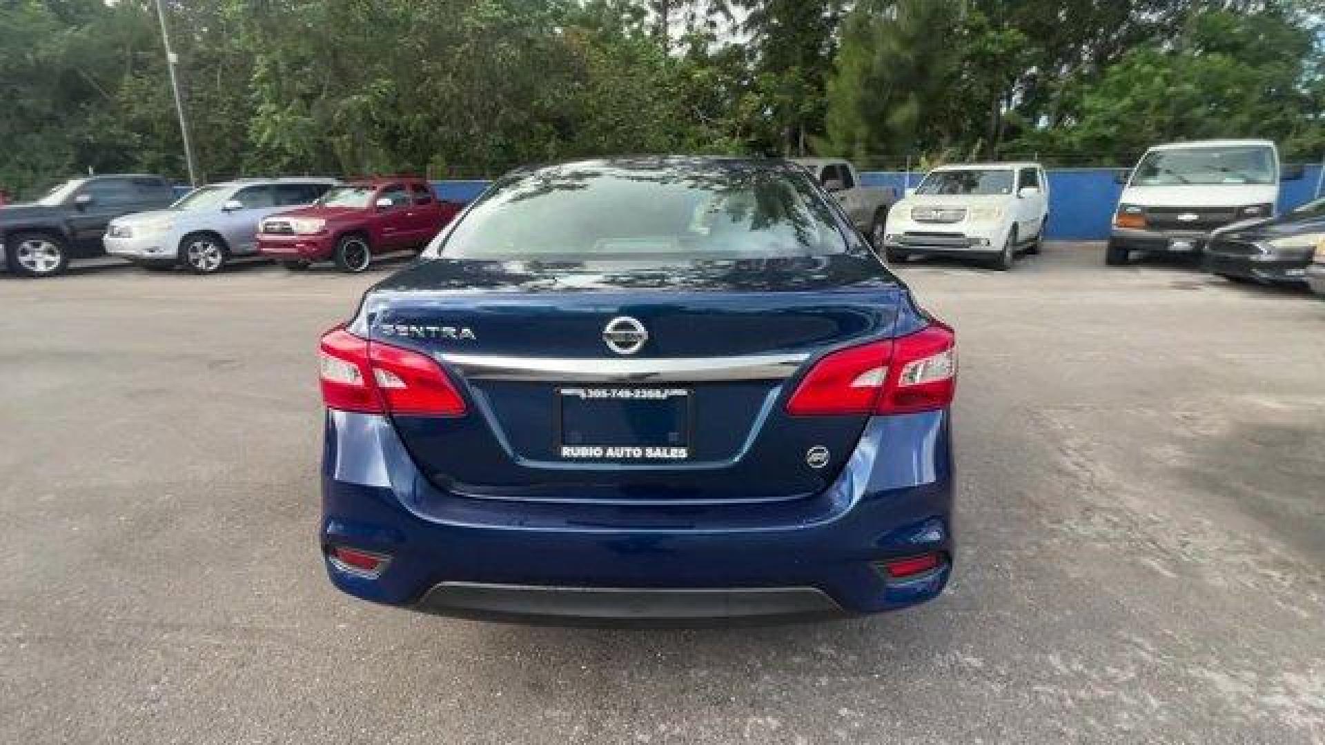 2019 Deep Blue Pearl /Charcoal Nissan Sentra (3N1AB7APXKY) with an 4 1.8 L engine, Variable transmission, located at 27610 S Dixie Hwy, Homestead, FL, 33032, (305) 749-2348, 25.510241, -80.438301 - Only 56,174 Miles! Boasts 37 Highway MPG and 29 City MPG! This Nissan Sentra boasts a Regular Unleaded I-4 1.8 L/110 engine powering this Variable transmission. DEEP BLUE PEARL, CHARCOAL, CLOTH SEAT TRIM, [L92] CARPETED FLOOR MATS W/TRUNK MAT.*This Nissan Sentra Comes Equipped with These Options *Wi - Photo#3