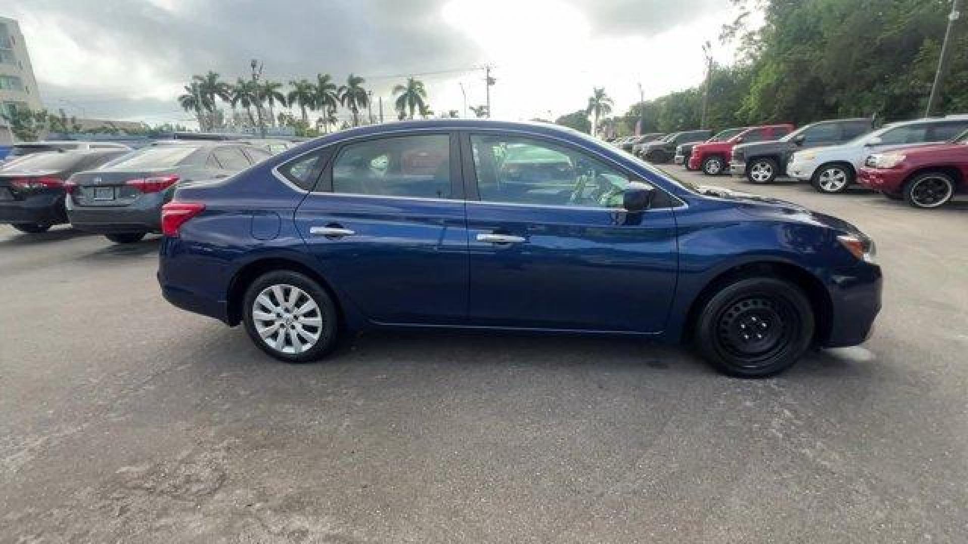 2019 Deep Blue Pearl /Charcoal Nissan Sentra (3N1AB7APXKY) with an 4 1.8 L engine, Variable transmission, located at 27610 S Dixie Hwy, Homestead, FL, 33032, (305) 749-2348, 25.510241, -80.438301 - Only 56,174 Miles! Boasts 37 Highway MPG and 29 City MPG! This Nissan Sentra boasts a Regular Unleaded I-4 1.8 L/110 engine powering this Variable transmission. DEEP BLUE PEARL, CHARCOAL, CLOTH SEAT TRIM, [L92] CARPETED FLOOR MATS W/TRUNK MAT.*This Nissan Sentra Comes Equipped with These Options *Wi - Photo#5