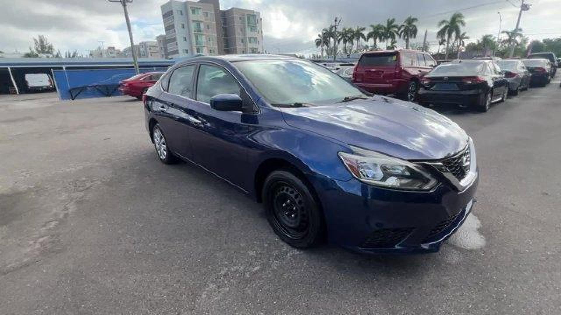 2019 Deep Blue Pearl /Charcoal Nissan Sentra (3N1AB7APXKY) with an 4 1.8 L engine, Variable transmission, located at 27610 S Dixie Hwy, Homestead, FL, 33032, (305) 749-2348, 25.510241, -80.438301 - Only 56,174 Miles! Boasts 37 Highway MPG and 29 City MPG! This Nissan Sentra boasts a Regular Unleaded I-4 1.8 L/110 engine powering this Variable transmission. DEEP BLUE PEARL, CHARCOAL, CLOTH SEAT TRIM, [L92] CARPETED FLOOR MATS W/TRUNK MAT.*This Nissan Sentra Comes Equipped with These Options *Wi - Photo#6