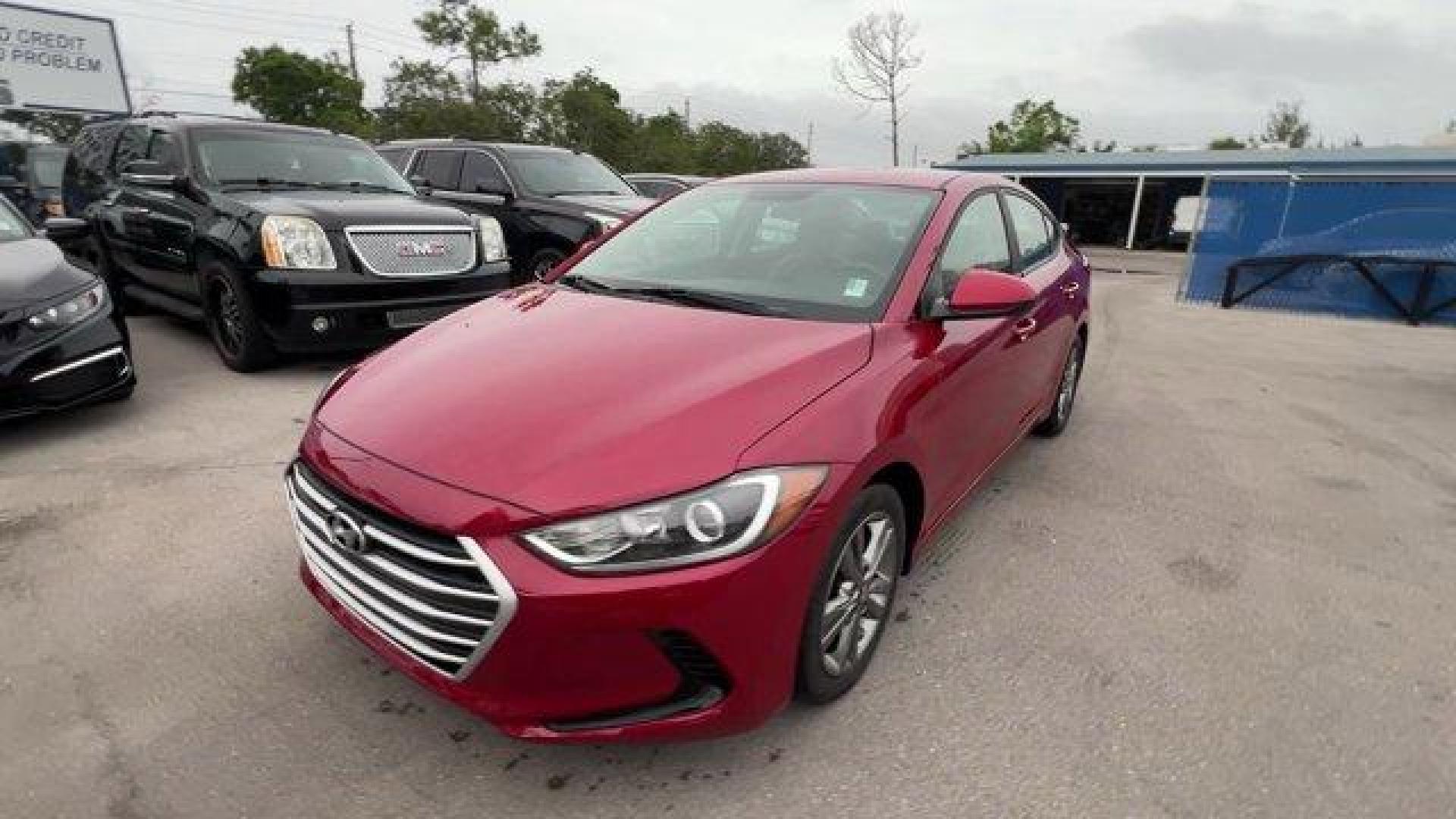 2017 Scarlet Red /Gray Hyundai Elantra (5NPD84LF6HH) with an 4 2.0 L engine, Automatic transmission, located at 27610 S Dixie Hwy, Homestead, FL, 33032, (305) 749-2348, 25.510241, -80.438301 - IIHS Top Safety Pick+, Top Safety Pick+. Only 75,817 Miles! Delivers 38 Highway MPG and 29 City MPG! This Hyundai Elantra boasts a Regular Unleaded I-4 2.0 L/122 engine powering this Automatic transmission. SE A/T POPULAR EQUIPMENT PACKAGE 02 -inc: Option Group 02, Auto Headlamp Control, Rearview Ca - Photo#0